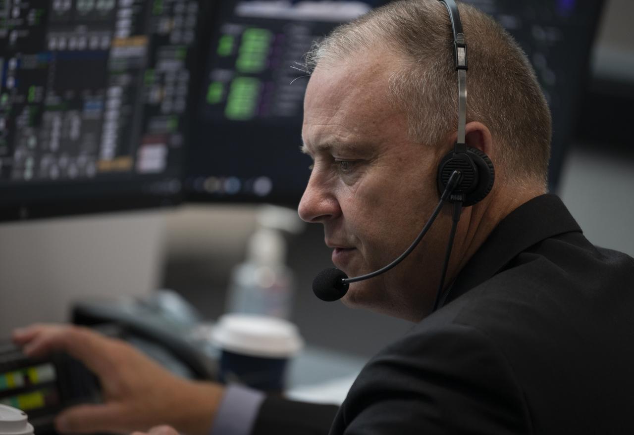 Norm Knight, deputy director of Flight Operations at NASA's Johnson Space Center, monitors the countdown of the launch attempt of a SpaceX Falcon 9 rocket carrying the company's Crew Dragon spacecraft on NASA’s SpaceX Demo-2 mission with NASA astronauts Robert Behnken and Douglas Hurley onboard, Wednesday, May 27, 2020, in firing room four of the Launch Control Center at NASA’s Kennedy Space Center in Florida. NASA’s SpaceX Demo-2 mission is the first launch with astronauts of the SpaceX Crew Dragon spacecraft and Falcon 9 rocket to the International Space Station as part of the agency’s Commercial Crew Program. The test flight serves as an end-to-end demonstration of SpaceX’s crew transportation system. Today’s launch of Behnken and Hurley was scrubbed due to weather and is now scheduled for 3:22 p.m. EDT on Saturday, May 30, from Launch Complex 39A at the Kennedy Space Center. A new era of human spaceflight is set to begin as American astronauts once again launch on an American rocket from American soil to low-Earth orbit for the first time since the conclusion of the Space Shuttle Program in 2011. Photo Credit: (NASA/Joel Kowsky)