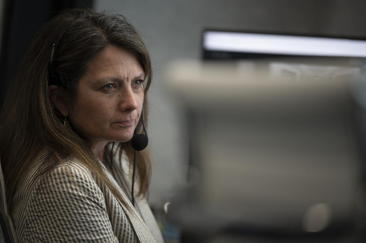 Angela Hart, Manager of the Mission Management and Integration Office of NASA’s Commercial Crew Program, monitors the countdown of the launch attempt of a SpaceX Falcon 9 rocket carrying the company's Crew Dragon spacecraft on NASA’s SpaceX Demo-2 mission with NASA astronauts Robert Behnken and Douglas Hurley onboard, Wednesday, May 27, 2020, in firing room four of the Launch Control Center at NASA’s Kennedy Space Center in Florida. NASA’s SpaceX Demo-2 mission is the first launch with astronauts of the SpaceX Crew Dragon spacecraft and Falcon 9 rocket to the International Space Station as part of the agency’s Commercial Crew Program. The test flight serves as an end-to-end demonstration of SpaceX’s crew transportation system. Today’s launch of Behnken and Hurley was scrubbed due to weather and is now scheduled for 3:22 p.m. EDT on Saturday, May 30, from Launch Complex 39A at the Kennedy Space Center. A new era of human spaceflight is set to begin as American astronauts once again launch on an American rocket from American soil to low-Earth orbit for the first time since the conclusion of the Space Shuttle Program in 2011. Photo Credit: (NASA/Joel Kowsky)