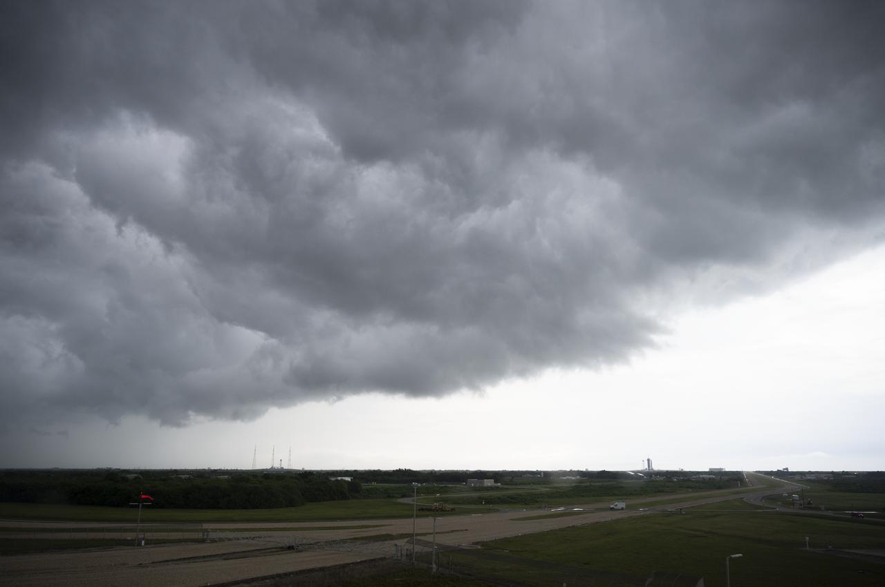 Storm clouds are seen out the windows of firing room four monitor during an attempted launch of a SpaceX Falcon 9 rocket carrying the company's Crew Dragon spacecraft on NASA’s SpaceX Demo-2 mission with NASA astronauts Robert Behnken and Douglas Hurley onboard, Wednesday, May 27, 2020, in the Launch Control Center at NASA’s Kennedy Space Center in Florida. NASA’s SpaceX Demo-2 mission is the first launch with astronauts of the SpaceX Crew Dragon spacecraft and Falcon 9 rocket to the International Space Station as part of the agency’s Commercial Crew Program. The test flight serves as an end-to-end demonstration of SpaceX’s crew transportation system. Today’s launch of Behnken and Hurley was scrubbed due to weather and is now scheduled for 3:22 p.m. EDT on Saturday, May 30, from Launch Complex 39A at the Kennedy Space Center. A new era of human spaceflight is set to begin as American astronauts once again launch on an American rocket from American soil to low-Earth orbit for the first time since the conclusion of the Space Shuttle Program in 2011. Photo Credit: (NASA/Joel Kowsky)