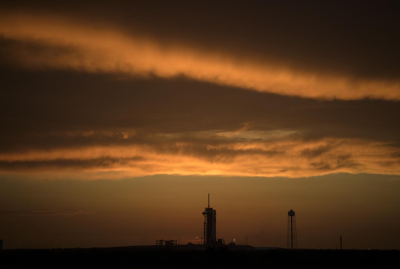 A SpaceX Falcon 9 rocket with the company's Crew Dragon spacecraft onboard is seen on the launch pad at Launch Complex 39A as preparations continue for the Demo-2 mission, Wednesday, May 27, 2020, at NASA’s Kennedy Space Center in Florida. NASA’s SpaceX Demo-2 mission is the first launch with astronauts of the SpaceX Crew Dragon spacecraft and Falcon 9 rocket to the International Space Station as part of the agency’s Commercial Crew Program. The test flight serves as an end-to-end demonstration of SpaceX’s crew transportation system. Today’s launch of Behnken and Hurley was scrubbed due to weather and is now scheduled for 3:22 p.m. EDT on Saturday, May 30, from Launch Complex 39A at the Kennedy Space Center. A new era of human spaceflight is set to begin as American astronauts once again launch on an American rocket from American soil to low-Earth orbit for the first time since the conclusion of the Space Shuttle Program in 2011. Photo Credit: (NASA/Bill Ingalls)