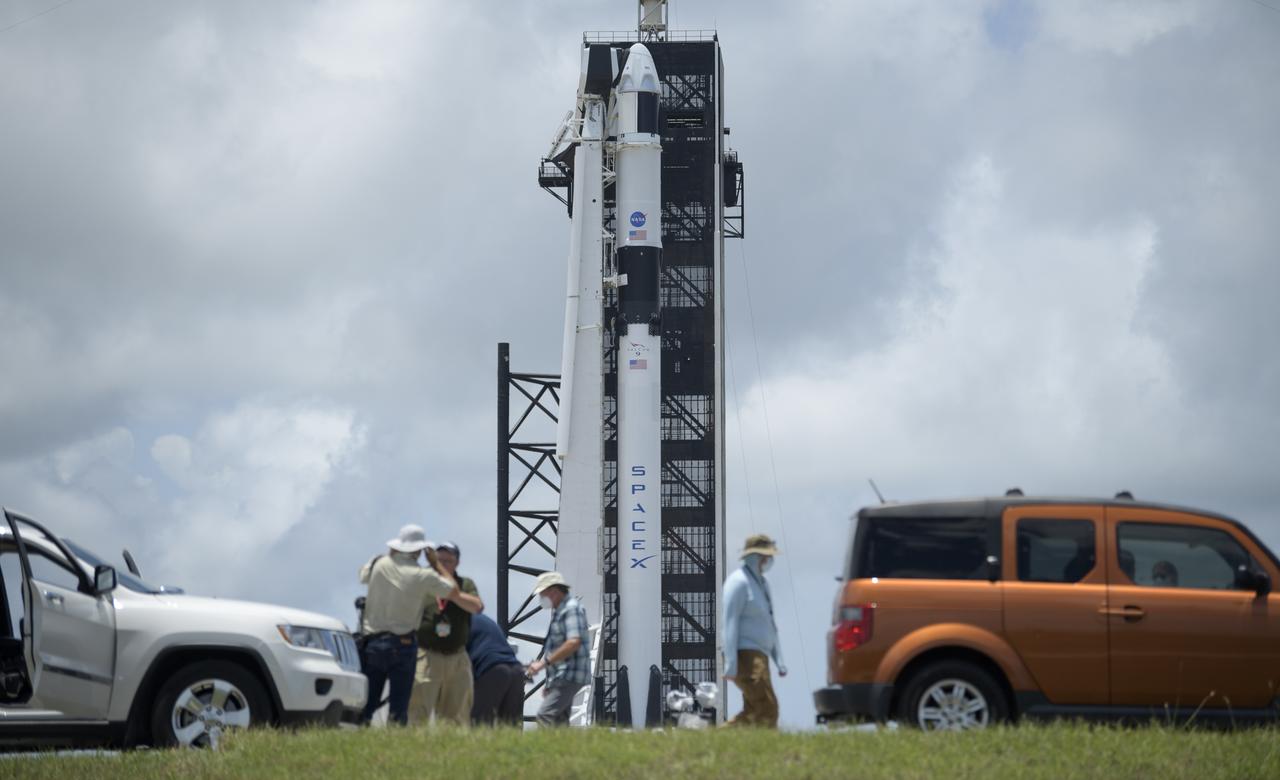 Photographers reset their remote cameras to capture the launch of the SpaceX Falcon 9 rocket with the company's Crew Dragon spacecraft onboard at Launch Complex 39A as preparations continue for the Demo-2 mission, Friday, May 29, 2020, at NASA’s Kennedy Space Center in Florida. NASA’s SpaceX Demo-2 mission is the first launch with astronauts of the SpaceX Crew Dragon spacecraft and Falcon 9 rocket to the International Space Station as part of the agency’s Commercial Crew Program. The test flight serves as an end-to-end demonstration of SpaceX’s crew transportation system. Robert Behnken and Douglas Hurley launched at 3:22 p.m. EDT on Saturday, May 30, from Launch Complex 39A at the Kennedy Space Center. A new era of human spaceflight is set to begin as American astronauts once again launch on an American rocket from American soil to low-Earth orbit for the first time since the conclusion of the Space Shuttle Program in 2011. Photo Credit: (NASA/Bill Ingalls)