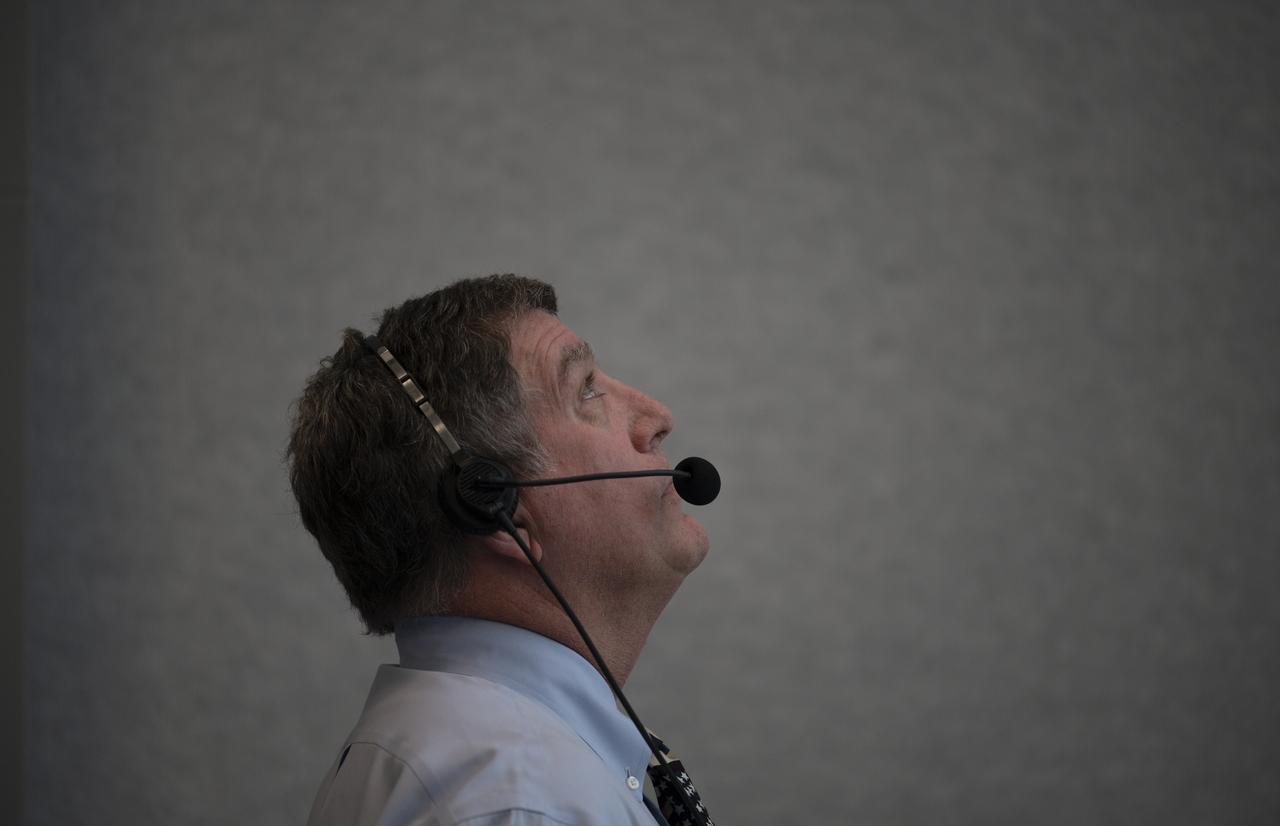 NASA International Space Station Program Manger Kirk Shireman watches the launch of a SpaceX Falcon 9 rocket carrying the company's Crew Dragon spacecraft on the Demo-2 mission with NASA astronauts Douglas Hurley and Robert Behnken onboard, Saturday, May 30, 2020, in  firing room four of the Launch Control Center at NASA’s Kennedy Space Center in Florida. NASA’s SpaceX Demo-2 mission is the first launch with astronauts of the SpaceX Crew Dragon spacecraft and Falcon 9 rocket to the International Space Station as part of the agency’s Commercial Crew Program. The test flight serves as an end-to-end demonstration of SpaceX’s crew transportation system. Behnken and Hurley launched at 3:22 p.m. EDT on Saturday, May 30, from Launch Complex 39A at the Kennedy Space Center. A new era of human spaceflight is set to begin as American astronauts once again launch on an American rocket from American soil to low-Earth orbit for the first time since the conclusion of the Space Shuttle Program in 2011. Photo Credit: (NASA/Joel Kowsky)