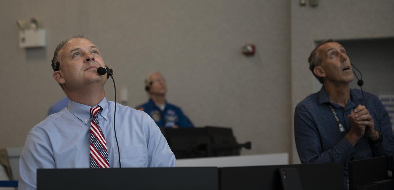 Norm Knight, deputy director of Flight Operations at NASA's Johnson Space Center, watches the launch of a SpaceX Falcon 9 rocket carrying the company's Crew Dragon spacecraft on the Demo-2 mission with NASA astronauts Douglas Hurley and Robert Behnken onboard, Saturday, May 30, 2020, in  firing room four of the Launch Control Center at NASA’s Kennedy Space Center in Florida. NASA’s SpaceX Demo-2 mission is the first launch with astronauts of the SpaceX Crew Dragon spacecraft and Falcon 9 rocket to the International Space Station as part of the agency’s Commercial Crew Program. The test flight serves as an end-to-end demonstration of SpaceX’s crew transportation system. Behnken and Hurley launched at 3:22 p.m. EDT on Saturday, May 30, from Launch Complex 39A at the Kennedy Space Center. A new era of human spaceflight is set to begin as American astronauts once again launch on an American rocket from American soil to low-Earth orbit for the first time since the conclusion of the Space Shuttle Program in 2011. Photo Credit: (NASA/Joel Kowsky)
