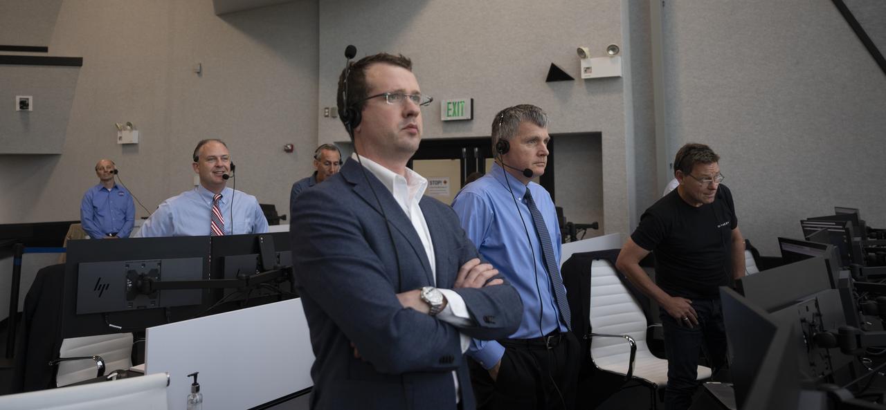 Stephen Koerner, Director of the Flight Operations Directorate at NASA’s Johnson Space Center, Norm Knight, deputy director of Flight Operations at NASA's Johnson Space Center, Steve Stich, deputy manager of NASA’s Commercial Crew Program, and Hans Koenigsmann, vice president for build and flight reliability at SpaceX are seen monitoring the launch of a SpaceX Falcon 9 rocket carrying the company's Crew Dragon spacecraft on the Demo-2 mission with NASA astronauts Douglas Hurley and Robert Behnken onboard, Saturday, May 30, 2020, in firing room four of the Launch Control Center at NASA’s Kennedy Space Center in Florida. NASA’s SpaceX Demo-2 mission is the first launch with astronauts of the SpaceX Crew Dragon spacecraft and Falcon 9 rocket to the International Space Station as part of the agency’s Commercial Crew Program. The test flight serves as an end-to-end demonstration of SpaceX’s crew transportation system. Behnken and Hurley launched at 3:22 p.m. EDT on Saturday, May 30, from Launch Complex 39A at the Kennedy Space Center. A new era of human spaceflight is set to begin as American astronauts once again launch on an American rocket from American soil to low-Earth orbit for the first time since the conclusion of the Space Shuttle Program in 2011. Photo Credit: (NASA/Joel Kowsky)