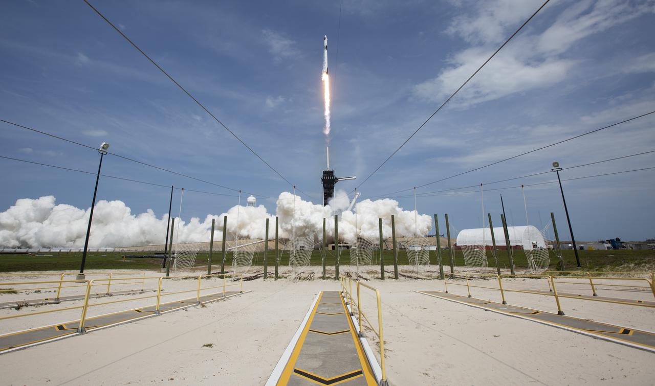 A SpaceX Falcon 9 rocket carrying the company's Crew Dragon spacecraft is launched from Launch Complex 39A on NASA’s SpaceX Demo-2 mission to the International Space Station with NASA astronauts Robert Behnken and Douglas Hurley onboard, Saturday, May 30, 2020, at NASA’s Kennedy Space Center in Florida. The Demo-2 mission is the first launch with astronauts of the SpaceX Crew Dragon spacecraft and Falcon 9 rocket to the International Space Station as part of the agency’s Commercial Crew Program. The test flight serves as an end-to-end demonstration of SpaceX’s crew transportation system. Behnken and Hurley launched at 3:22 p.m. EDT on Saturday, May 30, from Launch Complex 39A at the Kennedy Space Center. A new era of human spaceflight is set to begin as American astronauts once again launch on an American rocket from American soil to low-Earth orbit for the first time since the conclusion of the Space Shuttle Program in 2011. Photo Credit: (NASA/Bill Ingalls)