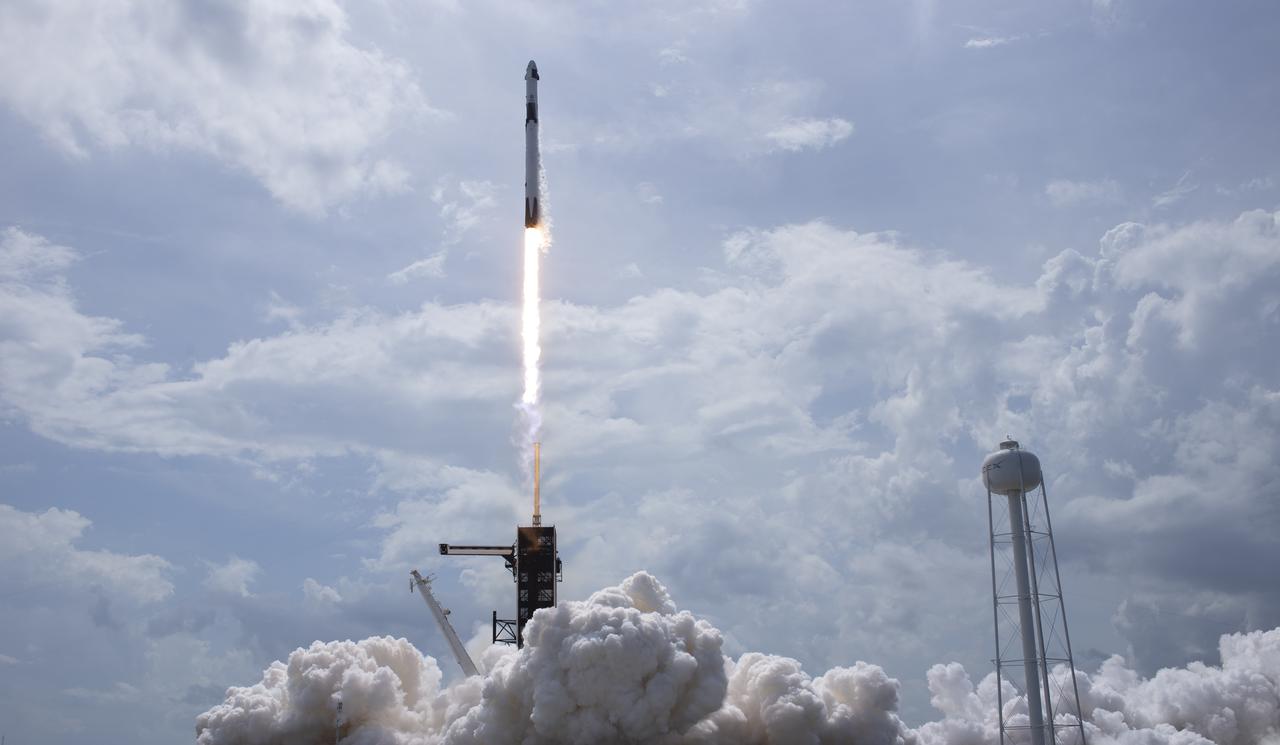 A SpaceX Falcon 9 rocket carrying the company's Crew Dragon spacecraft is launched from Launch Complex 39A on NASA’s SpaceX Demo-2 mission to the International Space Station with NASA astronauts Robert Behnken and Douglas Hurley onboard, Saturday, May 30, 2020, at NASA’s Kennedy Space Center in Florida. The Demo-2 mission is the first launch with astronauts of the SpaceX Crew Dragon spacecraft and Falcon 9 rocket to the International Space Station as part of the agency’s Commercial Crew Program. The test flight serves as an end-to-end demonstration of SpaceX’s crew transportation system. Behnken and Hurley launched at 3:22 p.m. EDT on Saturday, May 30, from Launch Complex 39A at the Kennedy Space Center. A new era of human spaceflight is set to begin as American astronauts once again launch on an American rocket from American soil to low-Earth orbit for the first time since the conclusion of the Space Shuttle Program in 2011. Photo Credit: (NASA/Bill Ingalls)