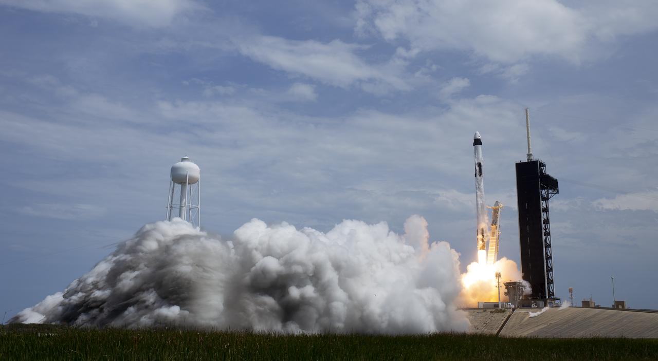A SpaceX Falcon 9 rocket carrying the company's Crew Dragon spacecraft is launched from Launch Complex 39A on NASA’s SpaceX Demo-2 mission to the International Space Station with NASA astronauts Robert Behnken and Douglas Hurley onboard, Saturday, May 30, 2020, at NASA’s Kennedy Space Center in Florida. The Demo-2 mission is the first launch with astronauts of the SpaceX Crew Dragon spacecraft and Falcon 9 rocket to the International Space Station as part of the agency’s Commercial Crew Program. The test flight serves as an end-to-end demonstration of SpaceX’s crew transportation system. Behnken and Hurley launched at 3:22 p.m. EDT on Saturday, May 30, from Launch Complex 39A at the Kennedy Space Center. A new era of human spaceflight is set to begin as American astronauts once again launch on an American rocket from American soil to low-Earth orbit for the first time since the conclusion of the Space Shuttle Program in 2011. Photo Credit: (NASA/Bill Ingalls)