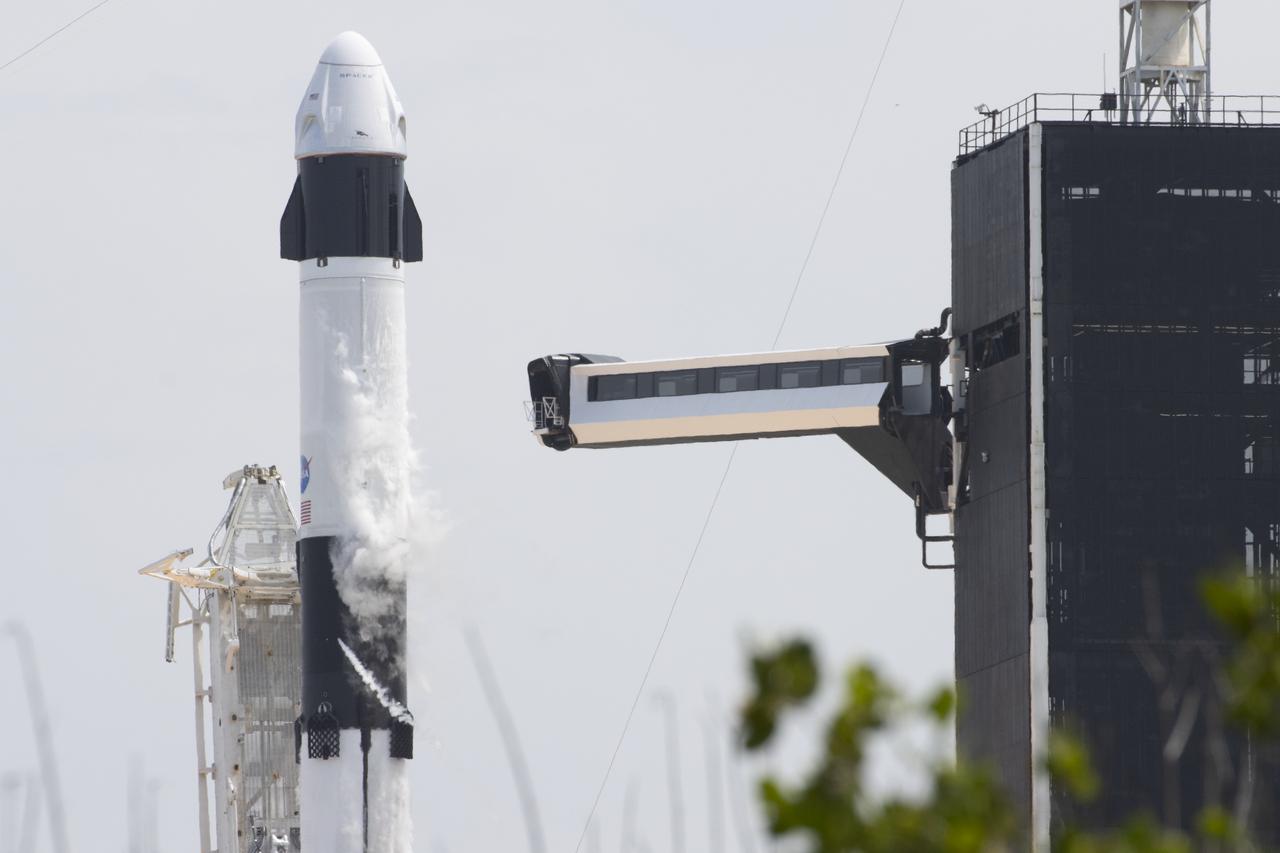 A SpaceX Falcon 9 rocket carrying the company's Crew Dragon spacecraft is launched from Launch Complex 39A on NASA’s SpaceX Demo-2 mission to the International Space Station with NASA astronauts Robert Behnken and Douglas Hurley onboard, Saturday, May 30, 2020, at NASA’s Kennedy Space Center in Florida. The Demo-2 mission is the first launch with astronauts of the SpaceX Crew Dragon spacecraft and Falcon 9 rocket to the International Space Station as part of the agency’s Commercial Crew Program. The test flight serves as an end-to-end demonstration of SpaceX’s crew transportation system. Behnken and Hurley launched at 3:22 p.m. EDT on Saturday, May 30, from Launch Complex 39A at the Kennedy Space Center. A new era of human spaceflight is set to begin as American astronauts once again launch on an American rocket from American soil to low-Earth orbit for the first time since the conclusion of the Space Shuttle Program in 2011. Photo Credit: (NASA/Joel Kowsky)