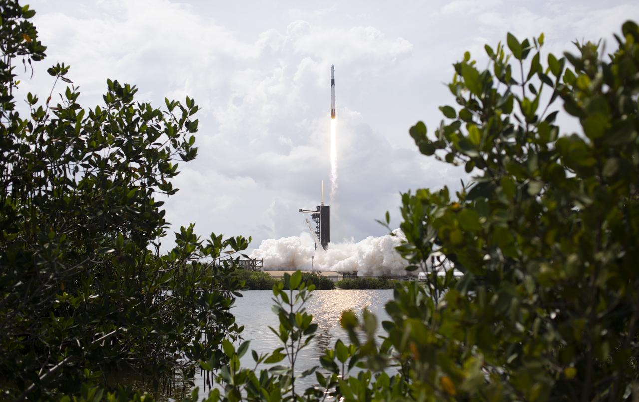 A SpaceX Falcon 9 rocket carrying the company's Crew Dragon spacecraft is launched from Launch Complex 39A on NASA’s SpaceX Demo-2 mission to the International Space Station with NASA astronauts Robert Behnken and Douglas Hurley onboard, Saturday, May 30, 2020, at NASA’s Kennedy Space Center in Florida. The Demo-2 mission is the first launch with astronauts of the SpaceX Crew Dragon spacecraft and Falcon 9 rocket to the International Space Station as part of the agency’s Commercial Crew Program. The test flight serves as an end-to-end demonstration of SpaceX’s crew transportation system. Behnken and Hurley launched at 3:22 p.m. EDT on Saturday, May 30, from Launch Complex 39A at the Kennedy Space Center. A new era of human spaceflight is set to begin as American astronauts once again launch on an American rocket from American soil to low-Earth orbit for the first time since the conclusion of the Space Shuttle Program in 2011. Photo Credit: (NASA/Bill Ingalls & Joel Kowsky)