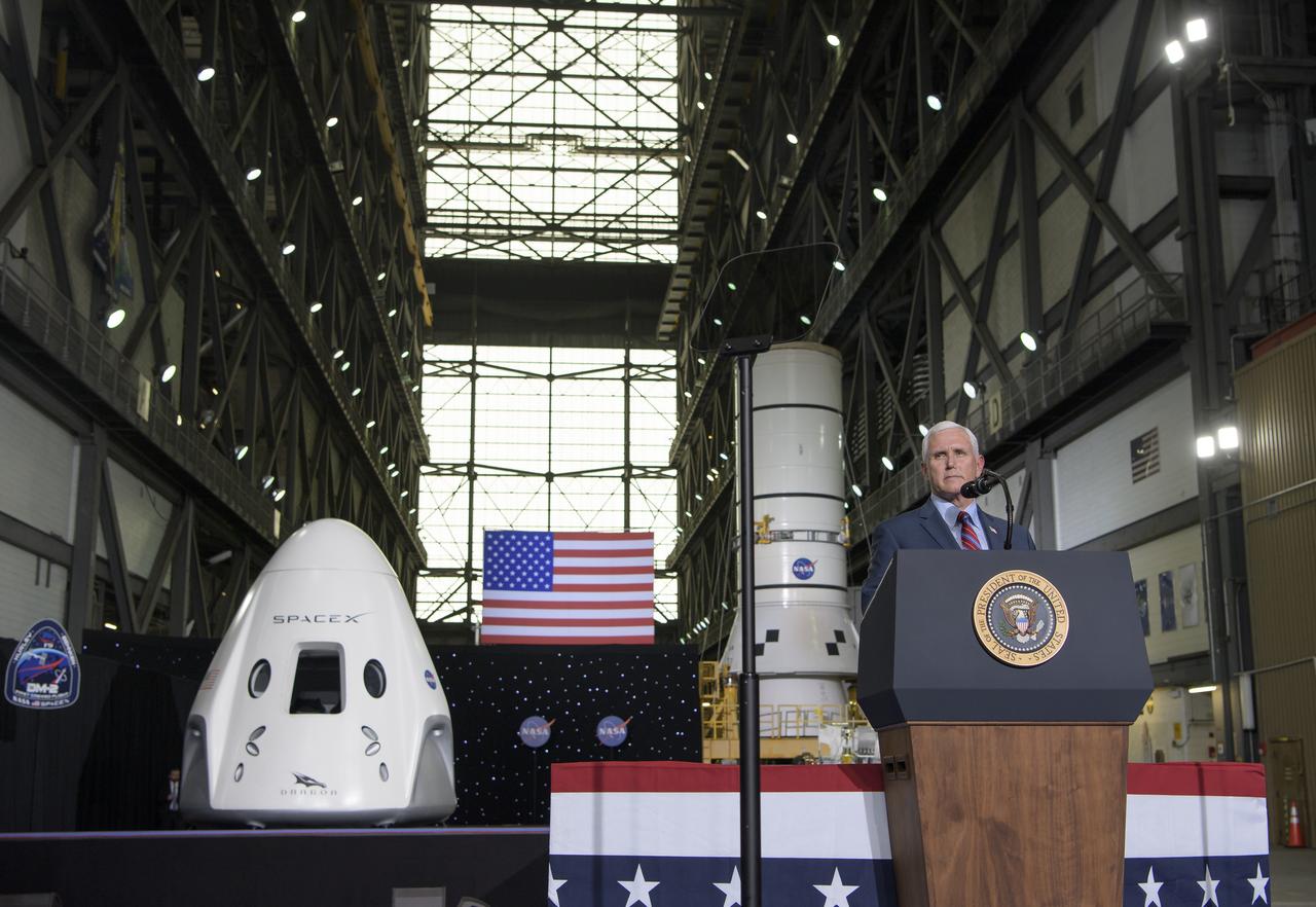 Vice President Mike Pence congratulates NASA and SpaceX teams inside the Vehicle Assembly Building following the launch of a SpaceX Falcon 9 rocket carrying the company's Crew Dragon spacecraft on NASA’s SpaceX Demo-2 mission with NASA astronauts Robert Behnken and Douglas Hurley onboard, Saturday, May 30, 2020, at NASA’s Kennedy Space Center in Florida. NASA’s SpaceX Demo-2 mission is the first launch with astronauts of the SpaceX Crew Dragon spacecraft and Falcon 9 rocket to the International Space Station as part of the agency’s Commercial Crew Program. The test flight serves as an end-to-end demonstration of SpaceX’s crew transportation system. Behnken and Hurley launched at 3:22 p.m. EDT on Saturday, May 30, from Launch Complex 39A at the Kennedy Space Center. A new era of human spaceflight is set to begin as American astronauts once again launch on an American rocket from American soil to low-Earth orbit for the first time since the conclusion of the Space Shuttle Program in 2011. Photo Credit: (NASA/Bill Ingalls)