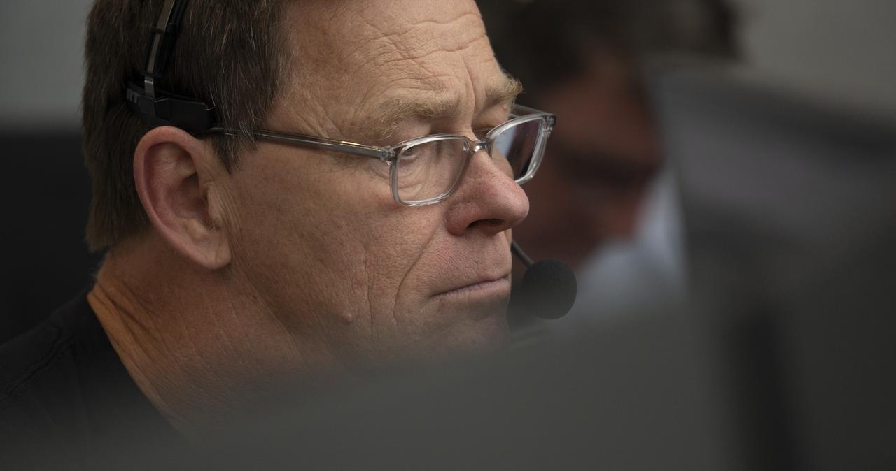 Hans Koenigsmann, vice president for build and flight reliability at SpaceX, monitors the countdown of the launch of a SpaceX Falcon 9 rocket carrying the company's Crew Dragon spacecraft on NASA’s SpaceX Demo-2 mission with NASA astronauts Robert Behnken and Douglas Hurley onboard, Saturday, May 30, 2020, in firing room four of the Launch Control Center at NASA’s Kennedy Space Center in Florida. NASA’s SpaceX Demo-2 mission is the first launch with astronauts of the SpaceX Crew Dragon spacecraft and Falcon 9 rocket to the International Space Station as part of the agency’s Commercial Crew Program. The test flight serves as an end-to-end demonstration of SpaceX’s crew transportation system. Behnken and Hurley launched at 3:22 p.m. EDT on Saturday, May 30, from Launch Complex 39A at the Kennedy Space Center. A new era of human spaceflight is set to begin as American astronauts once again launch on an American rocket from American soil to low-Earth orbit for the first time since the conclusion of the Space Shuttle Program in 2011. Photo Credit: (NASA/Joel Kowsky)