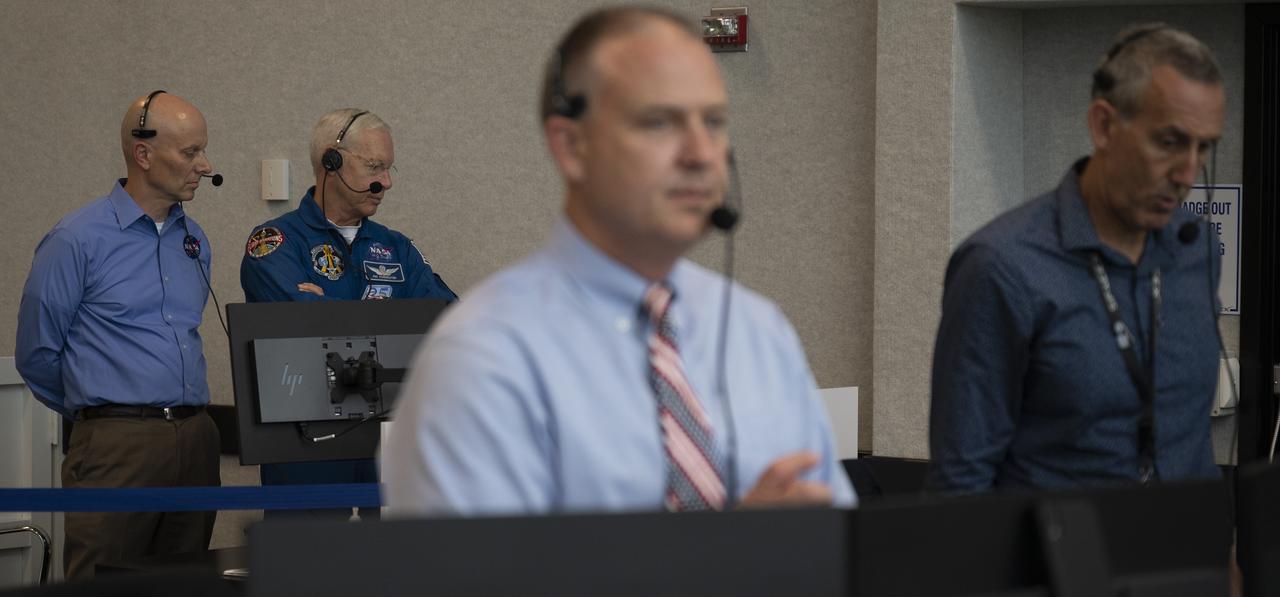 Stephen Koerner, Director of the Flight Operations Directorate at NASA’s Johnson Space Center, left, Pat Forrester, NASA’s chief of the astronaut office, Norm Knight, deputy director of Flight Operations at NASA's Johnson Space Center, and Lee Rosen, vice president for mission and launch operations at SpaceX, monitor the launch of a SpaceX Falcon 9 rocket carrying the company's Crew Dragon spacecraft on the Demo-2 mission with NASA astronauts Douglas Hurley and Robert Behnken onboard, Saturday, May 30, 2020, in  firing room four of the Launch Control Center at NASA’s Kennedy Space Center in Florida. NASA’s SpaceX Demo-2 mission is the first launch with astronauts of the SpaceX Crew Dragon spacecraft and Falcon 9 rocket to the International Space Station as part of the agency’s Commercial Crew Program. The test flight serves as an end-to-end demonstration of SpaceX’s crew transportation system. Behnken and Hurley launched at 3:22 p.m. EDT on Saturday, May 30, from Launch Complex 39A at the Kennedy Space Center. A new era of human spaceflight is set to begin as American astronauts once again launch on an American rocket from American soil to low-Earth orbit for the first time since the conclusion of the Space Shuttle Program in 2011. Photo Credit: (NASA/Joel Kowsky)