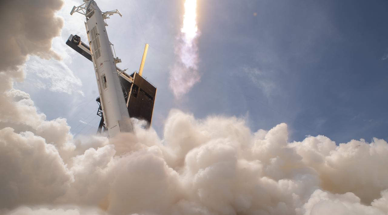 A SpaceX Falcon 9 rocket carrying the company's Crew Dragon spacecraft is launched on NASA’s SpaceX Demo-2 mission to the International Space Station with NASA astronauts Robert Behnken and Douglas Hurley onboard, Saturday, May 30, 2020, at NASA’s Kennedy Space Center in Florida. The Demo-2 mission is the first launch with astronauts of the SpaceX Crew Dragon spacecraft and Falcon 9 rocket to the International Space Station as part of the agency’s Commercial Crew Program. The test flight serves as an end-to-end demonstration of SpaceX’s crew transportation system. Behnken and Hurley launched at 3:22 p.m. EDT on Saturday, May 30, from Launch Complex 39A at the Kennedy Space Center. A new era of human spaceflight is set to begin as American astronauts once again launch on an American rocket from American soil to low-Earth orbit for the first time since the conclusion of the Space Shuttle Program in 2011. Photo Credit: (NASA/Joel Kowsky)