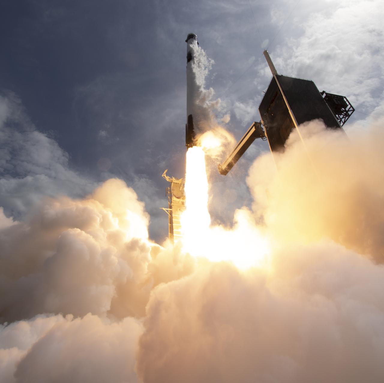 A SpaceX Falcon 9 rocket carrying the company's Crew Dragon spacecraft is launched on NASA’s SpaceX Demo-2 mission to the International Space Station with NASA astronauts Robert Behnken and Douglas Hurley onboard, Saturday, May 30, 2020, at NASA’s Kennedy Space Center in Florida. The Demo-2 mission is the first launch with astronauts of the SpaceX Crew Dragon spacecraft and Falcon 9 rocket to the International Space Station as part of the agency’s Commercial Crew Program. The test flight serves as an end-to-end demonstration of SpaceX’s crew transportation system. Behnken and Hurley launched at 3:22 p.m. EDT on Saturday, May 30, from Launch Complex 39A at the Kennedy Space Center. A new era of human spaceflight is set to begin as American astronauts once again launch on an American rocket from American soil to low-Earth orbit for the first time since the conclusion of the Space Shuttle Program in 2011. Photo Credit: (NASA/Bill Ingalls)