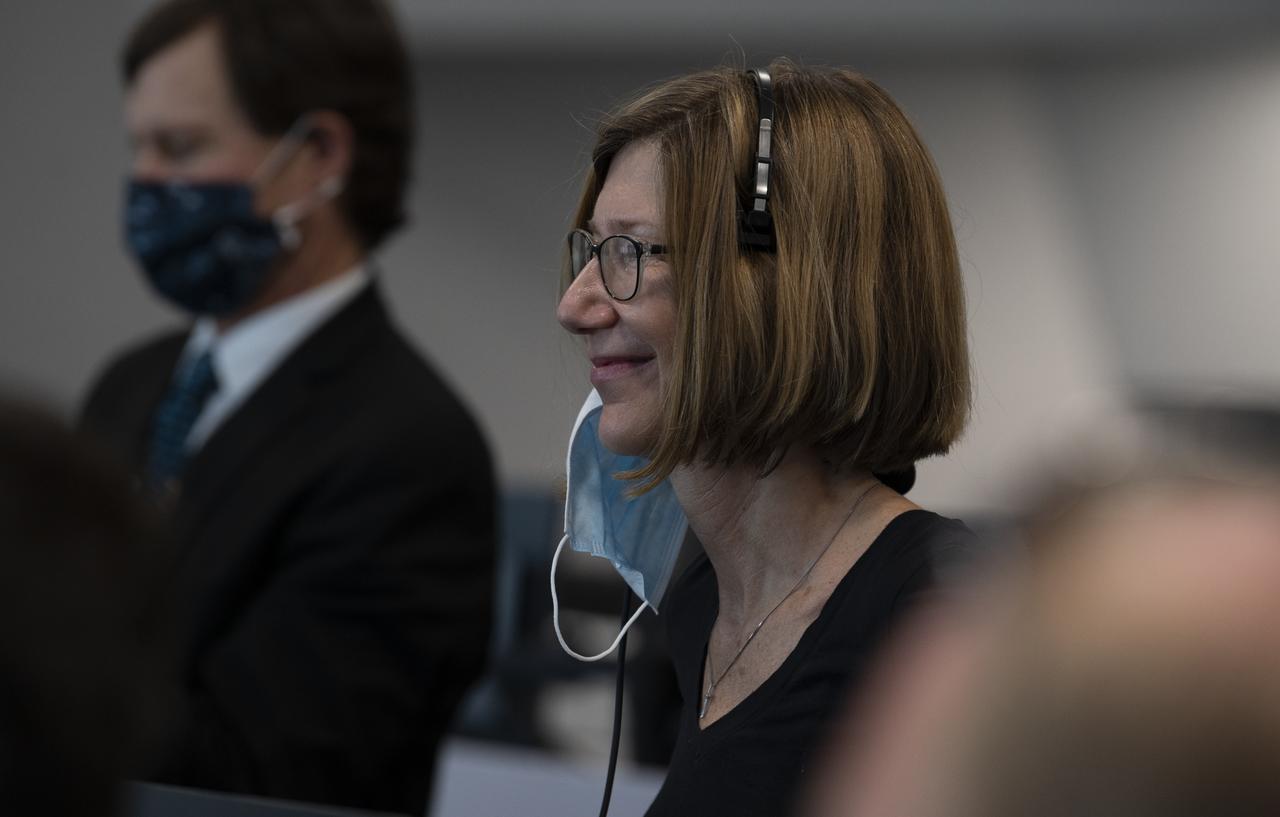 Kathy Lueders, manager of NASA's Commercial Crew Program,watchs the docking of SpaceX’s Crew Dragon spacecraft with NASA astronauts Douglas Hurley and Robert Behnken onboard to the International Space Station, Sunday, May 31, 2020, in firing room four of the Launch Control Center at NASA’s Kennedy Space Center in Florida. NASA’s SpaceX Demo-2 mission is the first launch with astronauts of the SpaceX Crew Dragon spacecraft and Falcon 9 rocket to the International Space Station as part of the agency’s Commercial Crew Program. The test flight serves as an end-to-end demonstration of SpaceX’s crew transportation system. Behnken and Hurley launched at 3:22 p.m. EDT on Saturday, May 30, from Launch Complex 39A at the Kennedy Space Center and docked with the International Space Station at 10:16am EDT on Sunday, May 31.. A new era of human spaceflight is set to begin as American astronauts once again launch on an American rocket from American soil to low-Earth orbit for the first time since the conclusion of the Space Shuttle Program in 2011. Photo Credit: (NASA/Joel Kowsky)