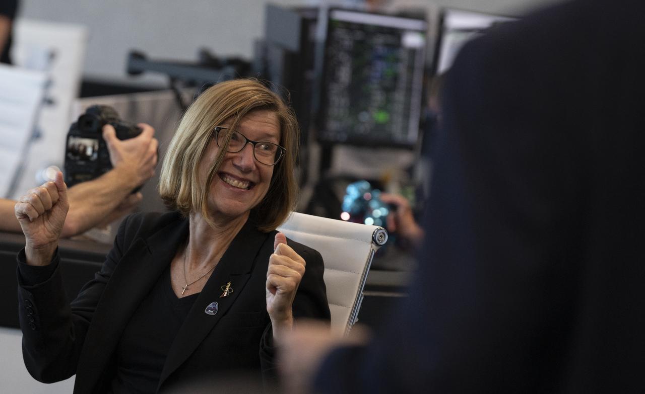 Kathy Lueders, manager of NASA's Commercial Crew Program, is seen after the hatches are opened between SpaceX’s Crew Dragon spacecraft with NASA astronauts Douglas Hurley and Robert Behnken onboard and the International Space Station, Sunday, May 31, 2020, in  firing room four of the Launch Control Center at NASA’s Kennedy Space Center in Florida. NASA’s SpaceX Demo-2 mission is the first launch with astronauts of the SpaceX Crew Dragon spacecraft and Falcon 9 rocket to the International Space Station as part of the agency’s Commercial Crew Program. The test flight serves as an end-to-end demonstration of SpaceX’s crew transportation system. Behnken and Hurley launched at 3:22 p.m. EDT on Saturday, May 30, from Launch Complex 39A at the Kennedy Space Center and docked with the International Space Station at 10:16am EDT on Sunday, May 31.. A new era of human spaceflight is set to begin as American astronauts once again launch on an American rocket from American soil to low-Earth orbit for the first time since the conclusion of the Space Shuttle Program in 2011. Photo Credit: (NASA/Joel Kowsky)