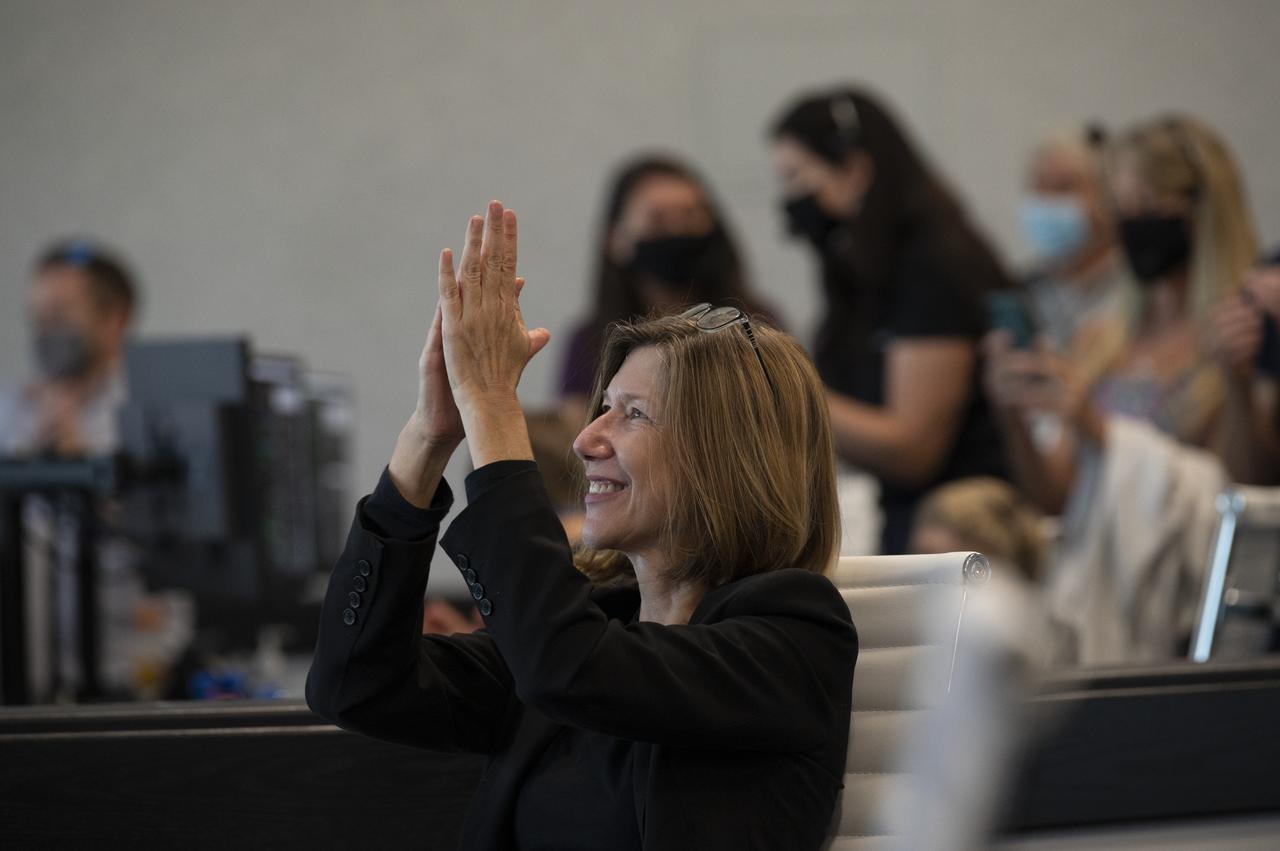 Kathy Lueders, manager of NASA's Commercial Crew Program, is seen after the hatches are opened between SpaceX’s Crew Dragon spacecraft with NASA astronauts Douglas Hurley and Robert Behnken onboard and the International Space Station, Sunday, May 31, 2020, in  firing room four of the Launch Control Center at NASA’s Kennedy Space Center in Florida. NASA’s SpaceX Demo-2 mission is the first launch with astronauts of the SpaceX Crew Dragon spacecraft and Falcon 9 rocket to the International Space Station as part of the agency’s Commercial Crew Program. The test flight serves as an end-to-end demonstration of SpaceX’s crew transportation system. Behnken and Hurley launched at 3:22 p.m. EDT on Saturday, May 30, from Launch Complex 39A at the Kennedy Space Center and docked with the International Space Station at 10:16am EDT on Sunday, May 31.. A new era of human spaceflight is set to begin as American astronauts once again launch on an American rocket from American soil to low-Earth orbit for the first time since the conclusion of the Space Shuttle Program in 2011. Photo Credit: (NASA/Joel Kowsky)