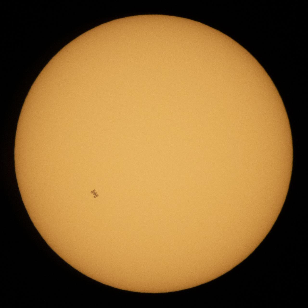The International Space Station, with a crew of five onboard, is seen in silhouette as it transits the Sun at roughly five miles per second, Wednesday, June 24, 2020, from Fredericksburg, Va. Onboard are Expedition 63 NASA astronauts Chris Cassidy, Douglas Hurley, Robert Behnken, and Roscosmos cosmonauts Anatoly Ivanishin and Ivan Vagner. Photo Credit: (NASA/Joel Kowsky)
