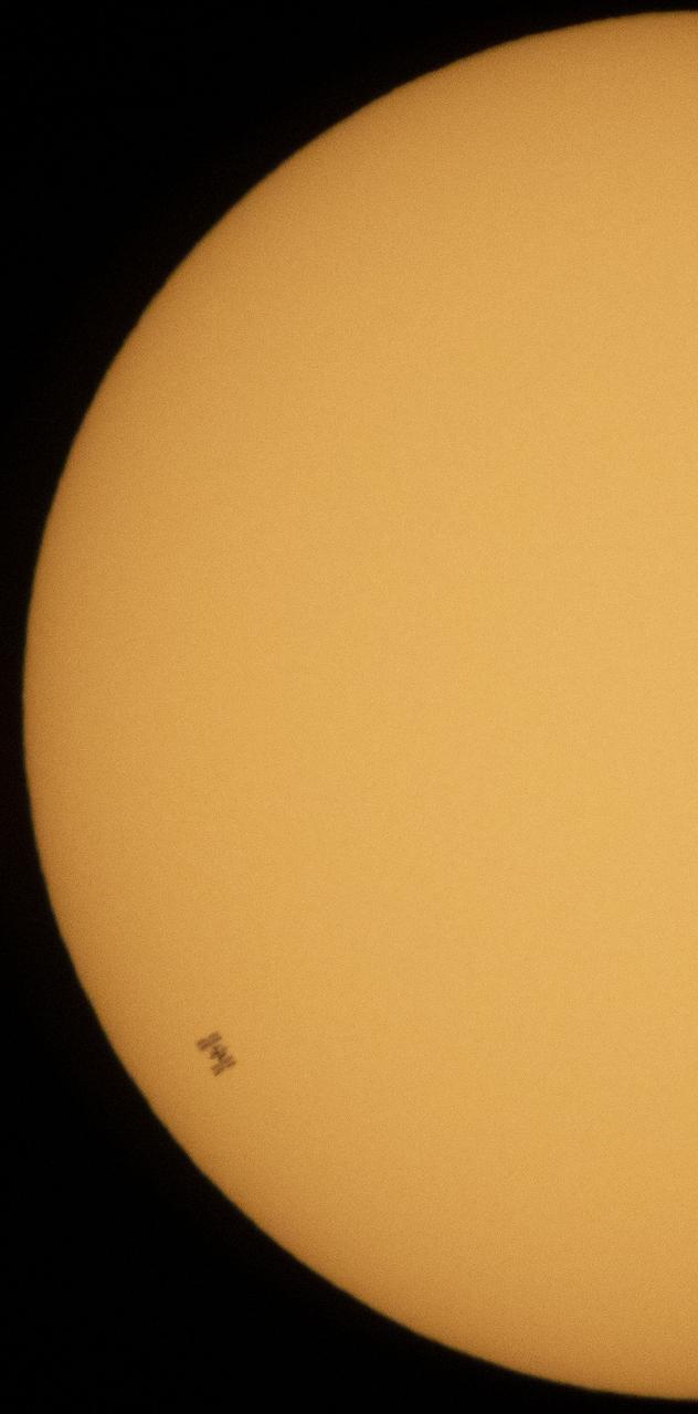 The International Space Station, with a crew of five onboard, is seen in silhouette as it transits the Sun at roughly five miles per second, Wednesday, June 24, 2020, from Fredericksburg, Va. Onboard are Expedition 63 NASA astronauts Chris Cassidy, Douglas Hurley, Robert Behnken, and Roscosmos cosmonauts Anatoly Ivanishin and Ivan Vagner. Photo Credit: (NASA/Joel Kowsky)