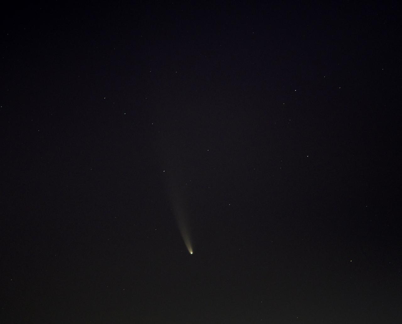 Comet NEOWISE is seen before sunrise over Washington, Sunday, July 12, 2020. The comet was discovered by NASA’s Near-Earth Object Wide-field Infrared Survey Explorer, or NEOWISE, on March 27. Since then, the comet — called comet C/2020 F3 NEOWISE and nicknamed comet NEOWISE — has been spotted by several NASA spacecraft, including Parker Solar Probe, NASA’s Solar and Terrestrial Relations Observatory, the ESA/NASA Solar and Heliospheric Observatory, and astronauts aboard the International Space Station. Photo Credit: (NASA/Bill Ingalls)