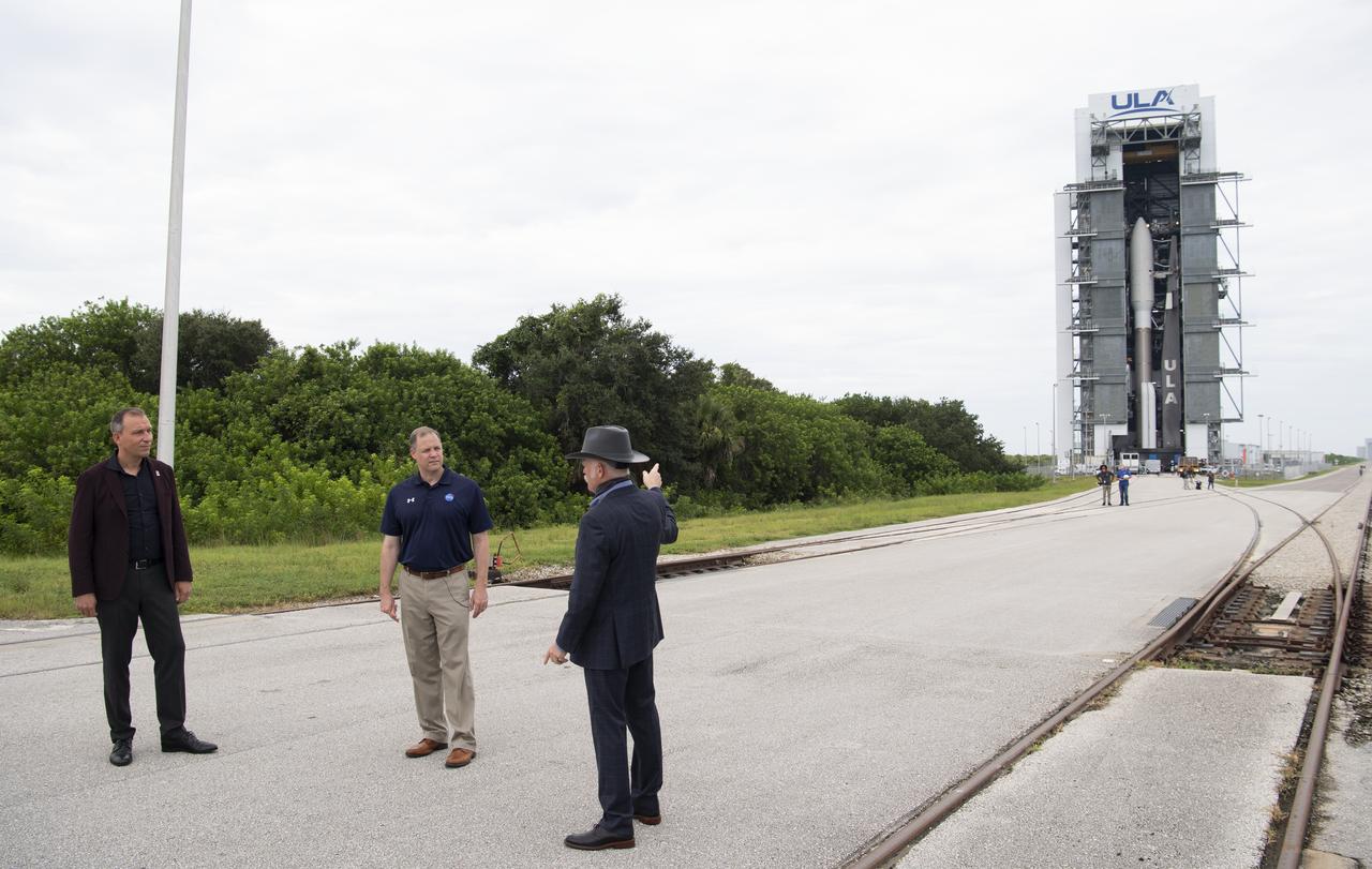 Thomas Zurbuchen, Associate Administrator for NASA's Science Mission Directorate, left, NASA Administrator Jim Bridenstine, and Tory Bruno, president and CEO of United Launch Alliance, are seen before the rollout of a United Launch Alliance Atlas V rocket with NASA’s Mars 2020 Perseverance to the launch pad at Space Launch Complex 41, Tuesday, July 28, 2020, at Cape Canaveral Air Force Station in Florida. The Perseverance rover is part of NASA’s Mars Exploration Program, a long-term effort of robotic exploration of the Red Planet. Launch is scheduled for Thursday, July 30. Photo Credit: (NASA/Joel Kowsky)