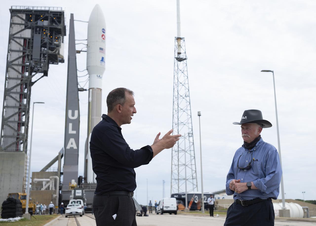 Thomas Zurbuchen, Associate Administrator for NASA's Science Mission Directorate, left, is seen with Tory Bruno, president and CEO of United Launch Alliance, after the rollout of a United Launch Alliance Atlas V rocket with NASA’s Mars 2020 Perseverance rover to the launch pad at Launch Complex 41, Tuesday, July 28, 2020, at Cape Canaveral Air Force Station in Florida. The Perseverance rover is part of NASA’s Mars Exploration Program, a long-term effort of robotic exploration of the Red Planet. Launch is scheduled for Thursday, July 30. Photo Credit: (NASA/Joel Kowsky)