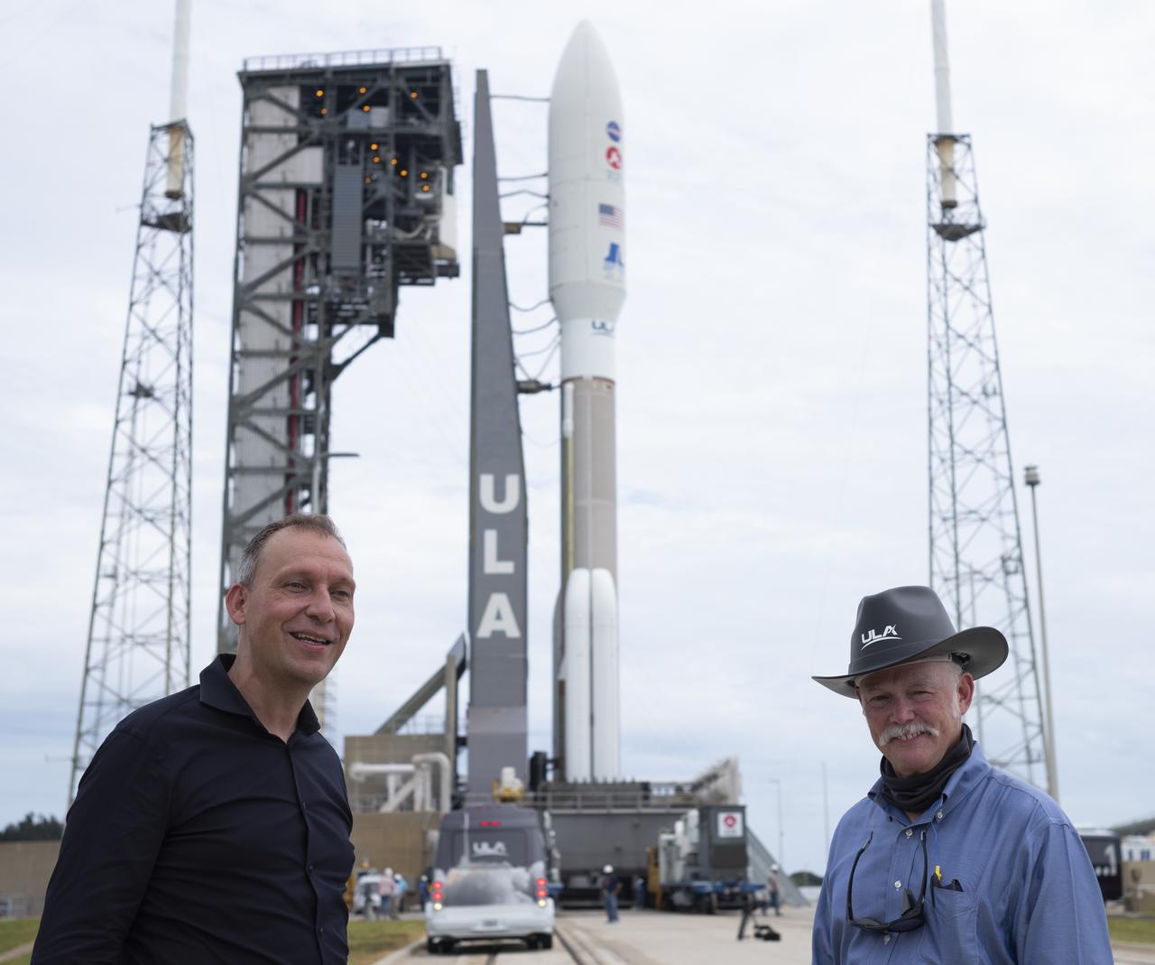 Thomas Zurbuchen, Associate Administrator for NASA's Science Mission Directorate, left, is seen with Tory Bruno, president and CEO of United Launch Alliance, after the rollout of a United Launch Alliance Atlas V rocket with NASA’s Mars 2020 Perseverance rover to the launch pad at Launch Complex 41, Tuesday, July 28, 2020, at Cape Canaveral Air Force Station in Florida. The Perseverance rover is part of NASA’s Mars Exploration Program, a long-term effort of robotic exploration of the Red Planet. Launch is scheduled for Thursday, July 30. Photo Credit: (NASA/Joel Kowsky)