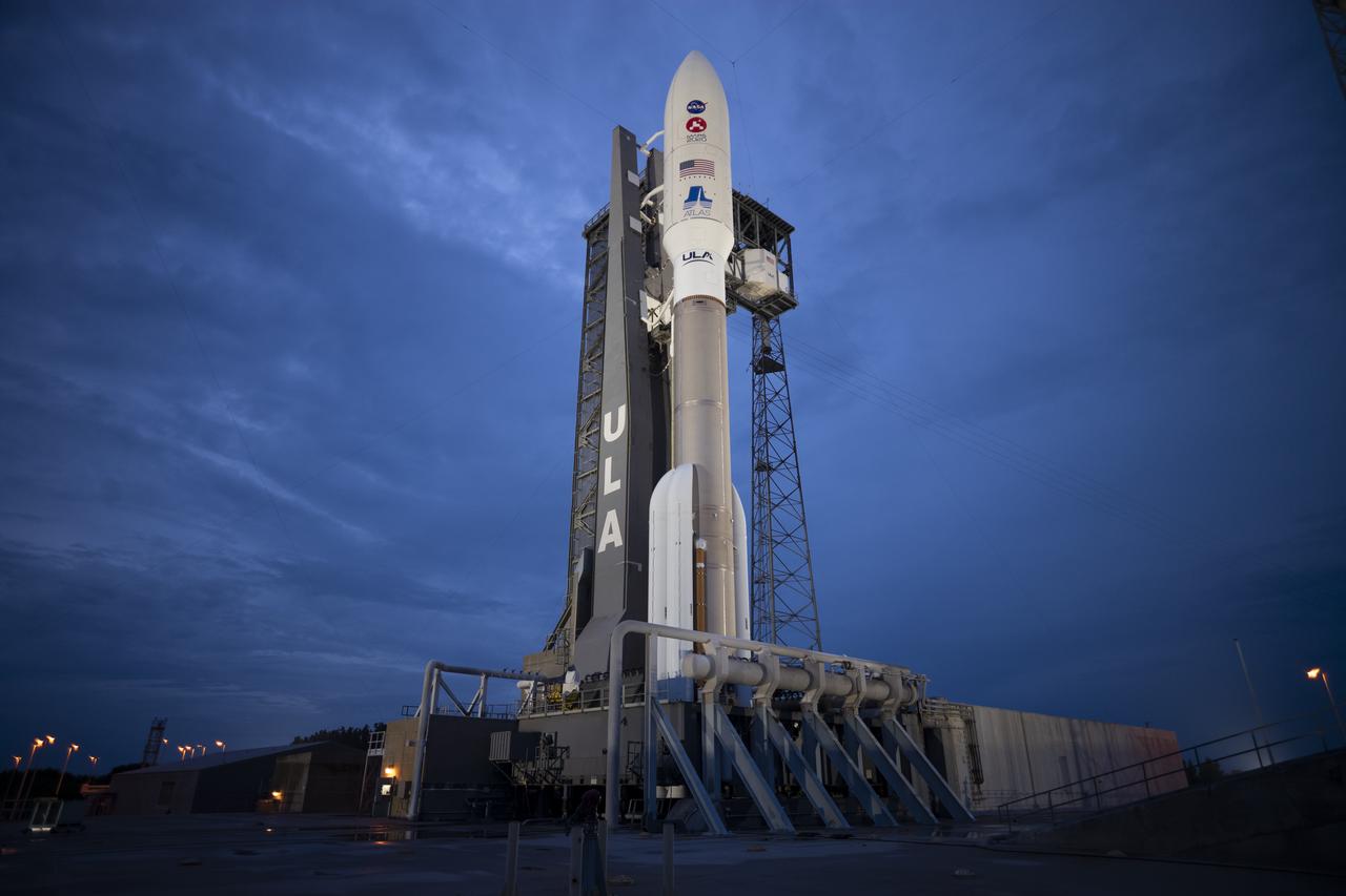 A United Launch Alliance Atlas V rocket with NASA’s Mars 2020 Perseverance rover onboard is seen illuminated by spotlights on the launch pad at Space Launch Complex 41, Tuesday, July 28, 2020, at Cape Canaveral Air Force Station in Florida. The Perseverance rover is part of NASA’s Mars Exploration Program, a long-term effort of robotic exploration of the Red Planet. Launch is scheduled for Thursday, July 30.  Photo Credit: (NASA/Joel Kowsky)