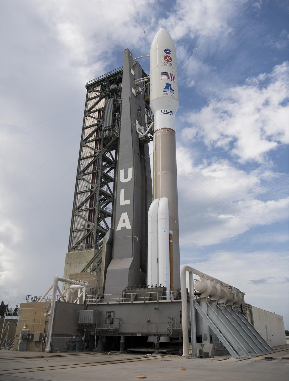 A United Launch Alliance Atlas V rocket with NASA’s Mars 2020 Perseverance rover onboard is seen on the launch pad at Space Launch Complex 41, Wednesday, July 29, 2020, at Cape Canaveral Air Force Station in Florida. The Perseverance rover is part of NASA’s Mars Exploration Program, a long-term effort of robotic exploration of the Red Planet. Launch is scheduled for Thursday, July 30.  Photo Credit: (NASA/Joel Kowsky)