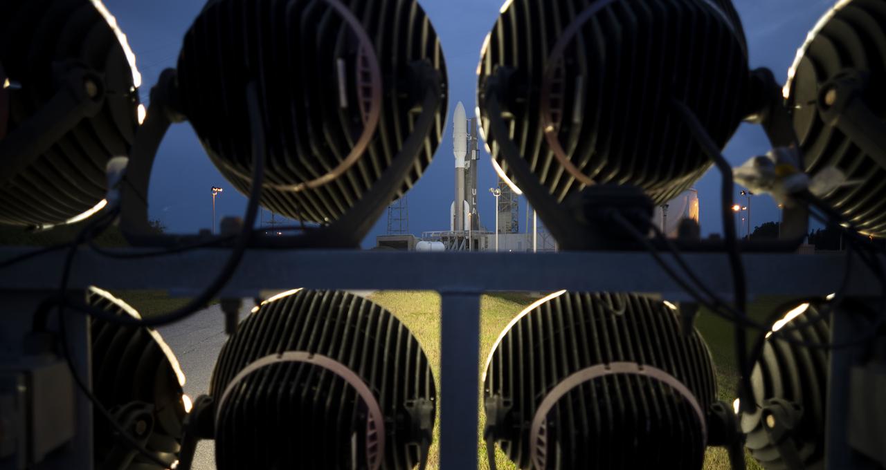 A United Launch Alliance Atlas V rocket with NASA’s Mars 2020 Perseverance rover onboard is seen illuminated by spotlights on the launch pad at Space Launch Complex 41, Wednesday, July 29, 2020, at Cape Canaveral Air Force Station in Florida. The Perseverance rover is part of NASA’s Mars Exploration Program, a long-term effort of robotic exploration of the Red Planet. Launch is scheduled for Thursday, July 30.  Photo Credit: (NASA/Joel Kowsky)