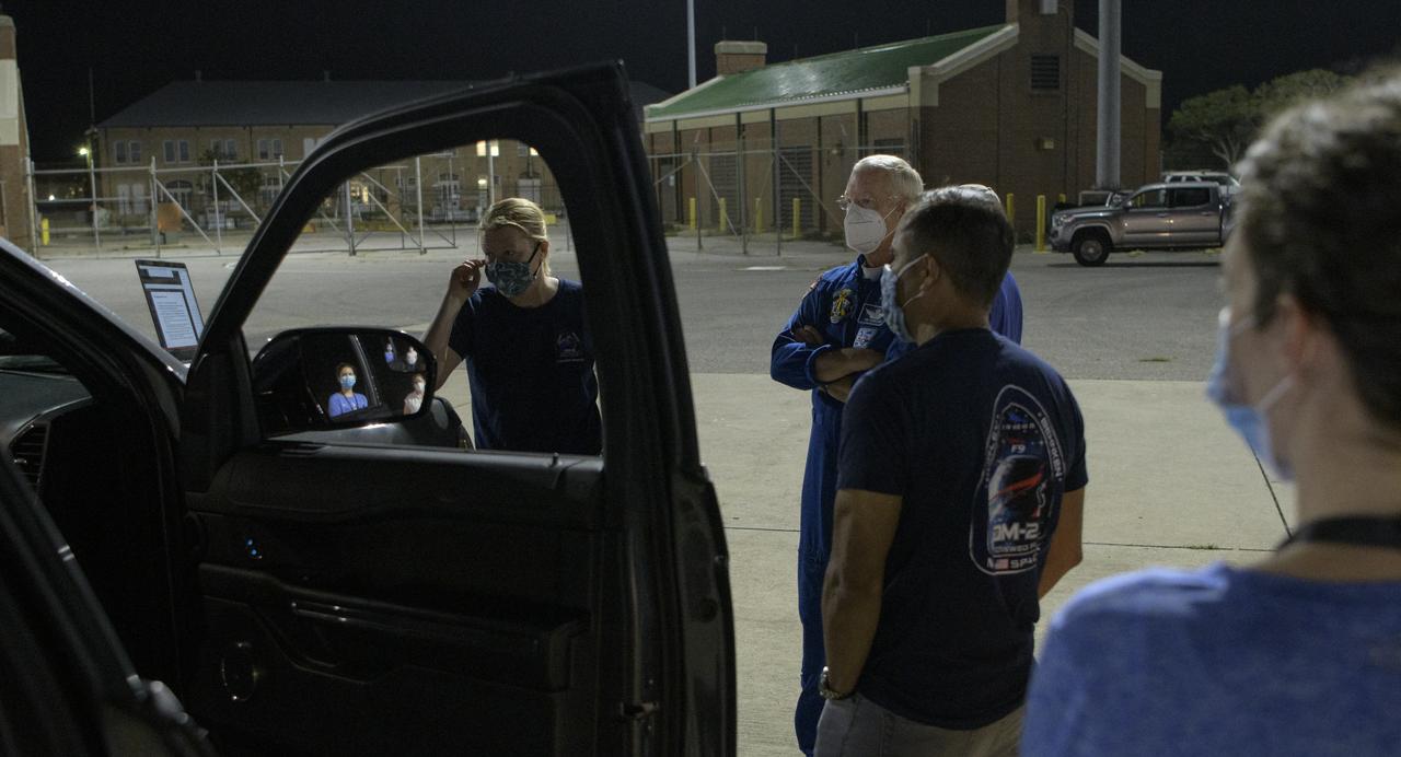 NASA and SpaceX support teams meet prior to boarding the SpaceX GO Navigator recovery ship for the landing of the SpaceX Crew Dragon Endeavour spacecraft with NASA astronauts Robert Behnken and Douglas Hurley onboard, Sunday, Aug. 2, 2020 in the Gulf of Mexico off the cost of Pensacola, Florida. The Demo-2 test flight for NASA's Commercial Crew Program is the first to deliver astronauts to the International Space Station and return them to Earth onboard a commercially built and operated spacecraft. Behnken and Hurley are returning after spending 64 days in space. Photo Credit: (NASA/Bill Ingalls)