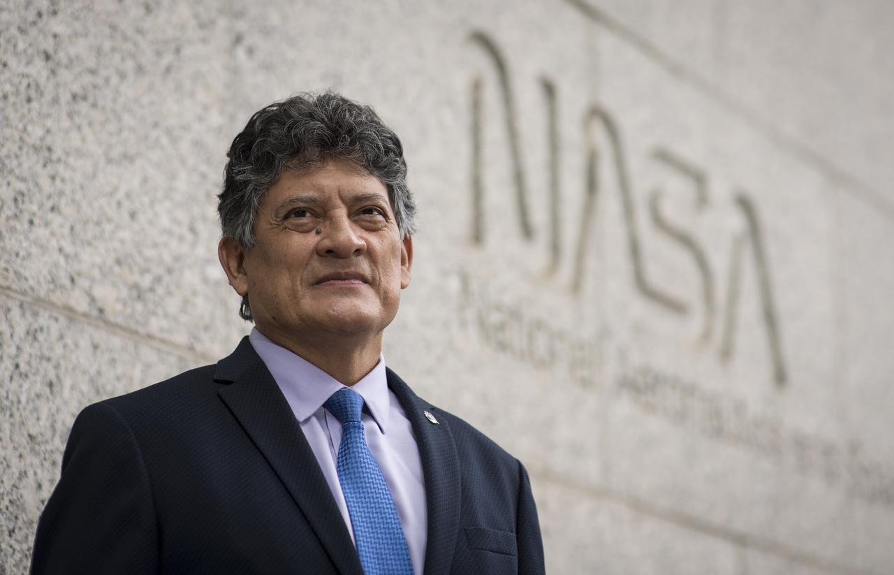 “My mother always instilled and made me appreciate the value of hard work and education. That was my pillar. We are a large family. I have family in Peru, still. I have family members in Europe, in Mexico, and across the U.S. They all face challenges every day, and that motivates me to keep moving forward. The military was no exception. It’s a challenging career. I’ve participated in war environments and peacekeeping operations.    When I retired from the military, I took the uniform off one day and put on civilian clothes the next day and went on to work for the Department of Defense. I progressed in my public service career and went on to National Oceanic and Atmospheric Administration. Then, I finally came to NASA.   I have always admired NASA. I remember since 1968, hearing about all the missions and projects and accomplishments. The reputation that NASA has! I researched how logistics work for NASA’s missions. That’s why I prepared myself. The military provided me a strong logistics background. I got a Master degree in Public Administration because my goal was to end up working for NASA. And I did so, on my second attempt. I started working for NASA’s Logistics Management Division, and served as Deputy Director. Working at NASA is something very special. I find myself surrounded by a group of professional individuals, working in a complete camaraderie environment.    Yes, it has been a challenge, to get to work for NASA. But it’s worth it, every single day.” NASA Program Executive Manager for the Office of Insfrastructure, Miguel Angel Rodriguez Maco, poses for a portrait outside NASA Headquarters in Washington DC, Wednesday, Sept. 2, 2020. Photo Credit: (NASA/Aubrey Gemignani)