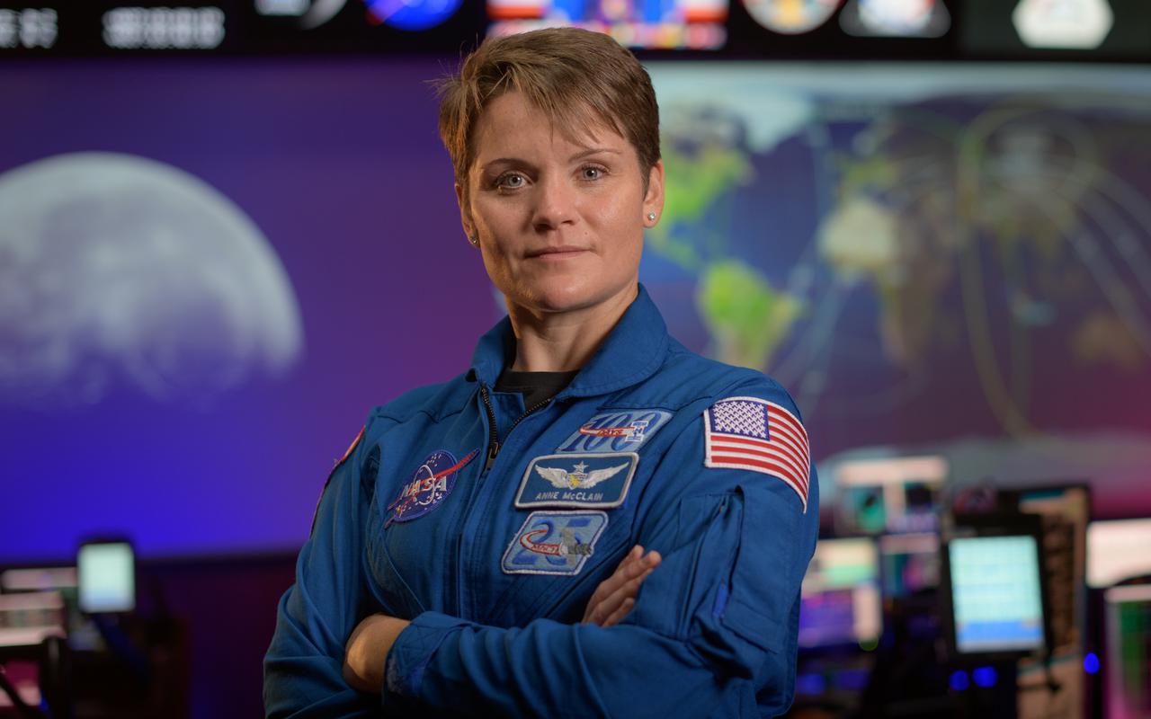 NASA astronaut Anne McClain poses for a portrait, Wednesday, Sept. 16, 2020, in the Blue Flight Control Room at NASA’s Johnson Space Center in Houston. Photo Credit: (NASA/Bill Ingalls)