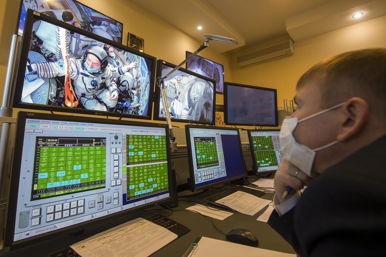 Expedition 64 crew members Sergey Ryzhikov of Roscosmos, left, and Sergey Kud-Sverchkov of Roscosmos are seen on monitors during the Soyuz qualification exams Wednesday, Sept. 23, 2020 at the Gagarin Cosmonaut Training Center (GCTC) in Star City, Russia, in advance of their scheduled launch October 14 from Baikonur Cosmodrome in Kazakhstan to the International Space Station. Photo Credit: (NASA/GCTC/Andrey Shelepin)