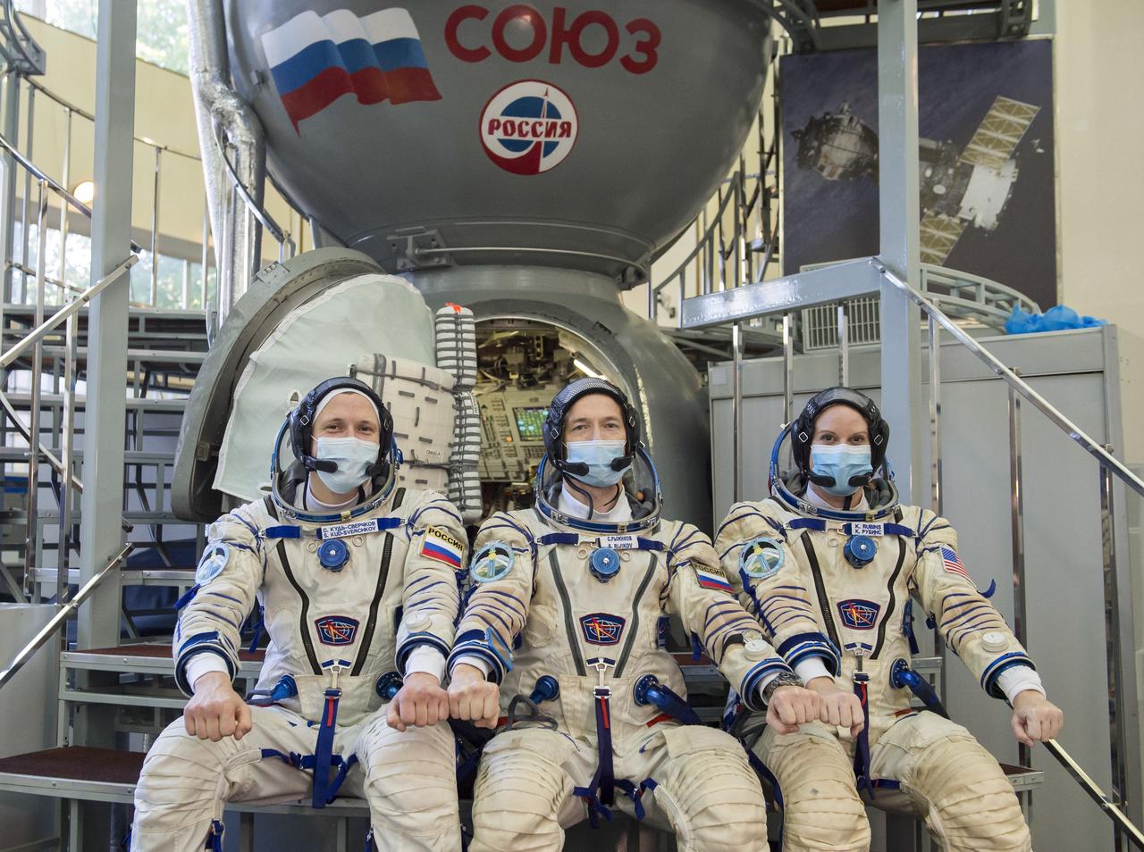 Expedition 64 crew members Russian cosmonaut Sergey Kud-Sverchkov of Roscosmos, left, Russian cosmonaut Sergey Ryzhikov of Roscosmos, center, and NASA astronaut Kate Rubins, right, pose for a photo during Soyuz qualification exams Wednesday, Sept. 23, 2020 at the Gagarin Cosmonaut Training Center (GCTC) in Star City, Russia. Photo Credit: (NASA/GCTC/Irina Spector)