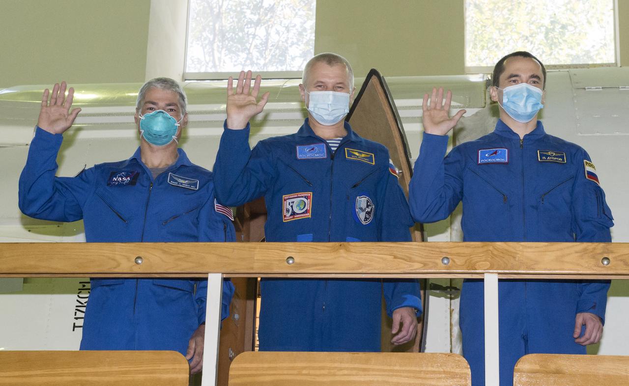 Expedition 64 backup crew members NASA astronaut Mark Vande Hei, left, Russian cosmonaut Oleg Novitskiy of Roscosmos, center, and Russian cosmonaut Petr Dubrov of Roscosmos wave during Soyuz qualification exams Wednesday, Sept. 23, 2020 at the Gagarin Cosmonaut Training Center (GCTC) in Star City, Russia. Photo Credit: (NASA/GCTC/Irina Spector)