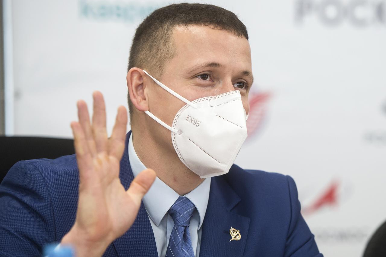 Expedition 64 prime crew member Sergey Kud-Sverchkov of Roscosmos, waves during a press conference prior to his launch from the Baikonur Cosmodrome in Kazakhstan, Thursday, Sept. 24, 2020 at the Gagarin Cosmonaut Training Center (GCTC) in Star City, Russia. Photo Credit: (NASA/GCTC/Andrey Shelepin)