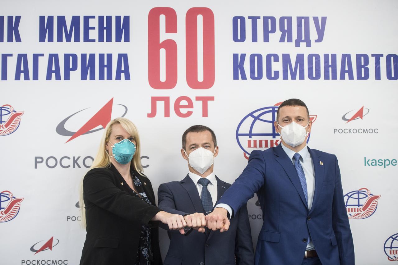 From left to right, Expedition 64 prime crew members, NASA astronaut Kate Rubins, Russian cosmonaut Sergey Ryzhikov of Roscosmos, and Russian cosmonaut Sergey Kud-Sverchkov of Roscosmos, pose for a photo at the conclusion of a press conference prior to their scheduled launch October 14 from the Baikonur Cosmodrome in Kazakhstan, Thursday, Sept. 24, 2020 at the Gagarin Cosmonaut Training Center (GCTC) in Star City, Russia. Photo Credit: (NASA/GCTC/Andrey Shelepin)