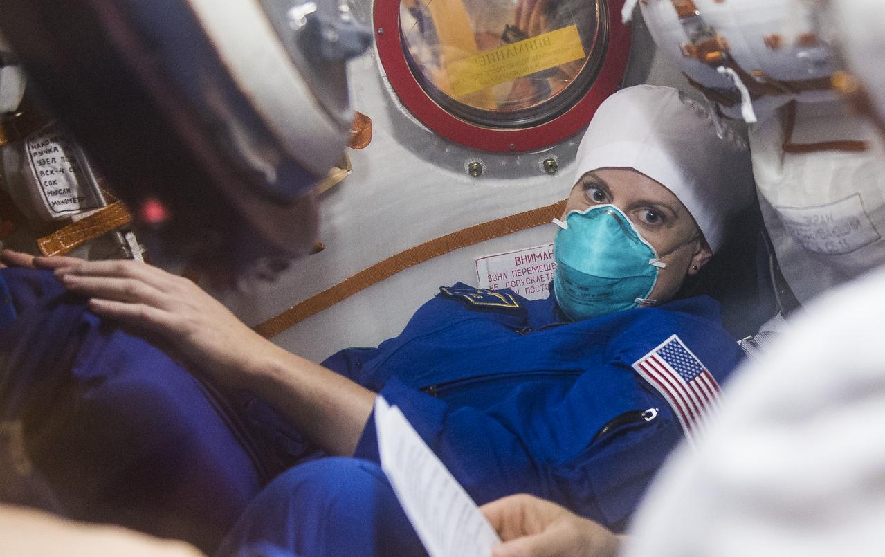 Expedition 64 NASA astronaut Kate Rubins is seen inside the Soyuz MS-17 spacecraft during the fit check to with Russian cosmonauts Sergey Ryzhikov and Sergey Kud-Sverchkov of Roscosmos, Monday, Sept. 28, 2020, at the Baikonur Cosmodrome in Kazakhstan. The trio are preparing for launch to the International Space Station in their Soyuz MS-17 spacecraft from the Baikonur Cosmodrome in Kazakhstan on October 14, Baikonur time. Photo Credit: (NASA/GCTC/Andrey Shelepin)
