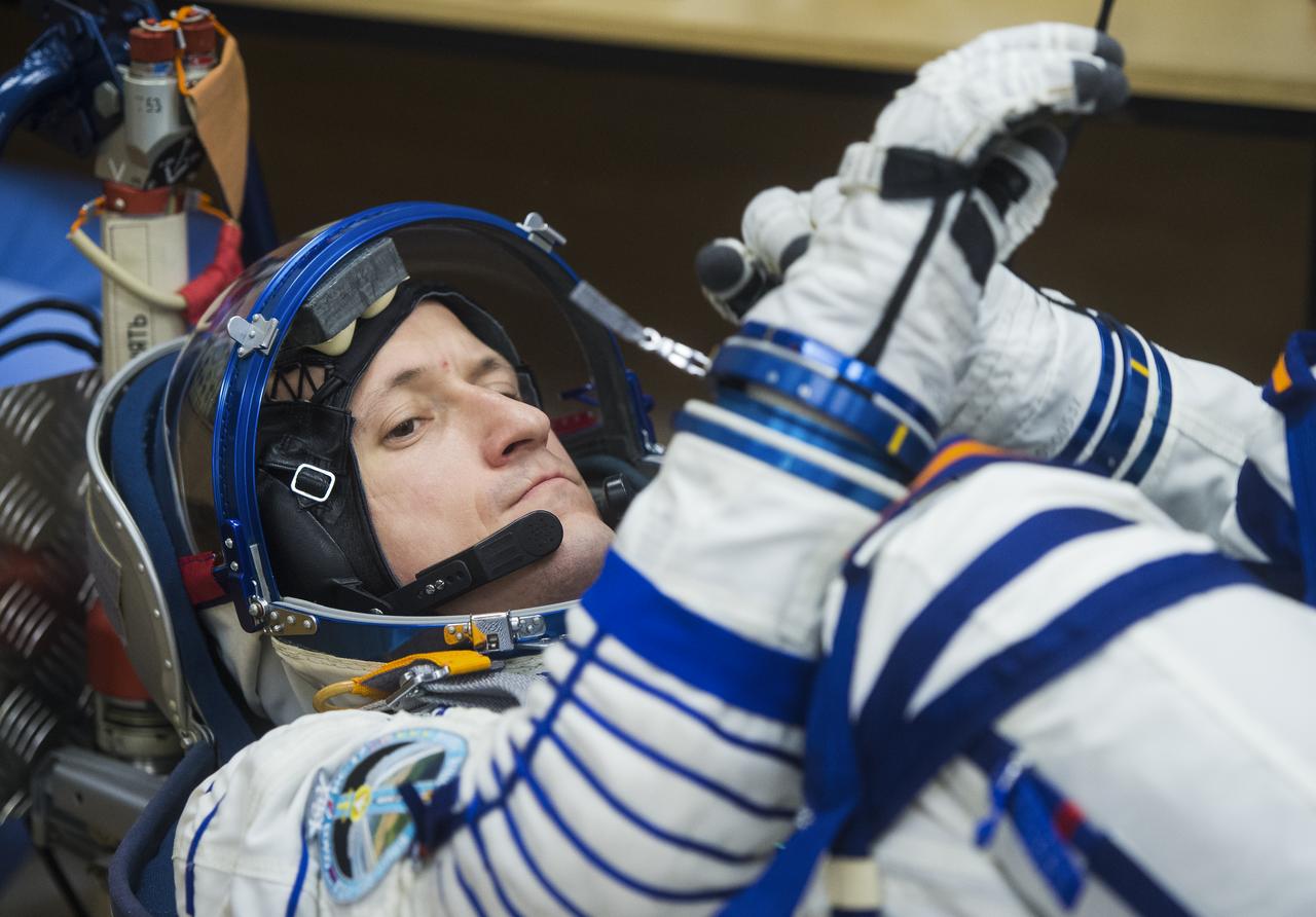 Expedition 64 Russian cosmonaut Sergey Kud-Sverchkov of Roscosmos is seen while having his Sokol suit pressure checked during the Soyuz MS-17 spacecraft fit check, Monday, Sept. 28, 2020, at the Baikonur Cosmodrome in Kazakhstan. Kud-Sverchkov, NASA astronaut Kate Rubins, and Russian cosmonaut Sergey Ryzhikov of Roscosmos are preparing for launch to the International Space Station in their Soyuz MS-17 spacecraft from the Baikonur Cosmodrome in Kazakhstan on October 14, Baikonur time. Photo Credit: (NASA/GCTC/Andrey Shelepin)