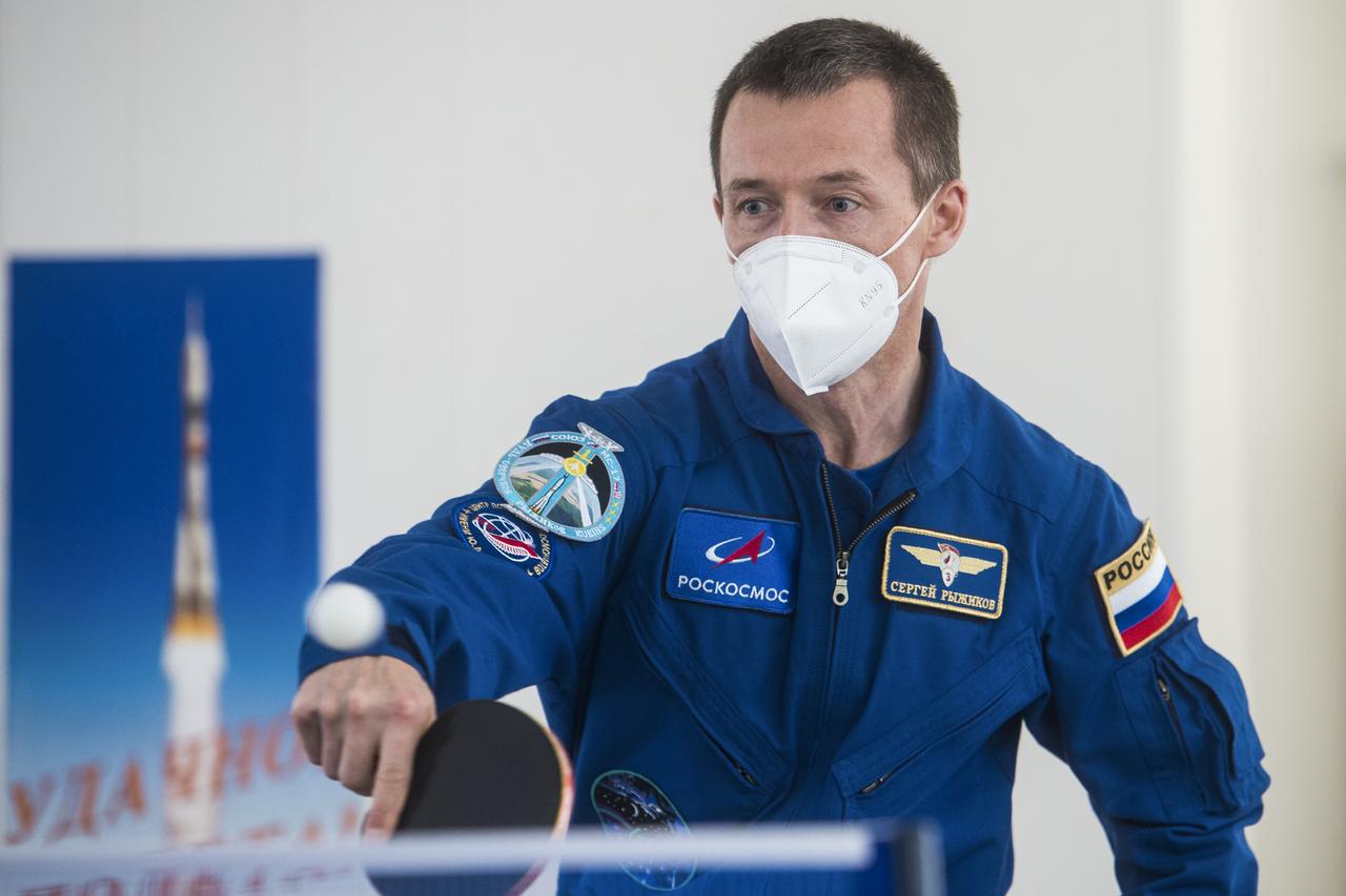 Expedition 64 crew member Sergey Ryzhikov of Roscosmos plays a game of ping-pong, Tuesday, Oct. 6, 2020, at the Cosmonaut Hotel in Baikonur, Kazakhstan. Ryzhikov, Sergey Kud-Sverchkov of Roscosmos and Kate Rubins of NASA are scheduled to launch to the International Space Station aboard the Soyuz MS-17 spacecraft on October 14. Photo Credit: (NASA/GCTC/Andrey Shelepin)