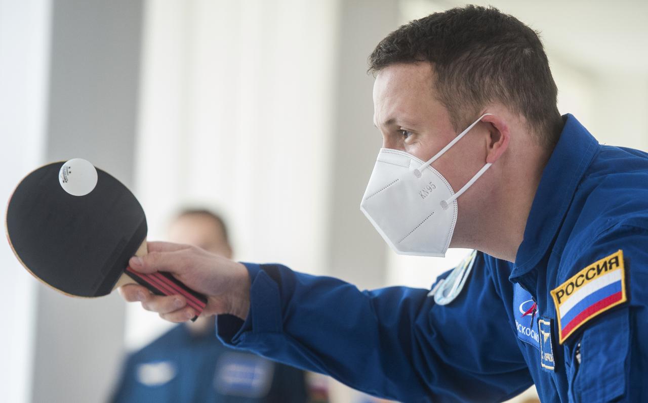 Expedition 64 crew member Sergey Kud-Sverchkov of Roscosmos plays a game of ping-pong, Tuesday, Oct. 6, 2020, at the Cosmonaut Hotel in Baikonur, Kazakhstan. Kud-Sverchkov, Sergey Ryzhikov of Roscosmos and Kate Rubins of NASA are scheduled to launch to the International Space Station aboard the Soyuz MS-17 spacecraft on October 14. Photo Credit: (NASA/GCTC/Andrey Shelepin)
