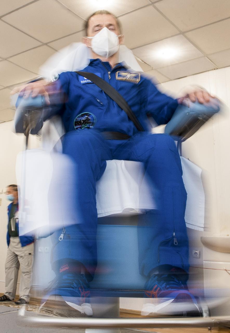 Expedition 64 Russian cosmonaut Sergey Ryzhikov of Roscosmos takes part in spin chair training, Tuesday, Oct. 6, 2020, at the Cosmonaut Hotel in Baikonur, Kazakhstan. Ryzhikov, Sergey Kud-Sverchkov of Roscosmos and Kate Rubins of NASA are scheduled to launch to the International Space Station aboard the Soyuz MS-17 spacecraft on October 14. Photo Credit: (NASA/GCTC/Andrey Shelepin)