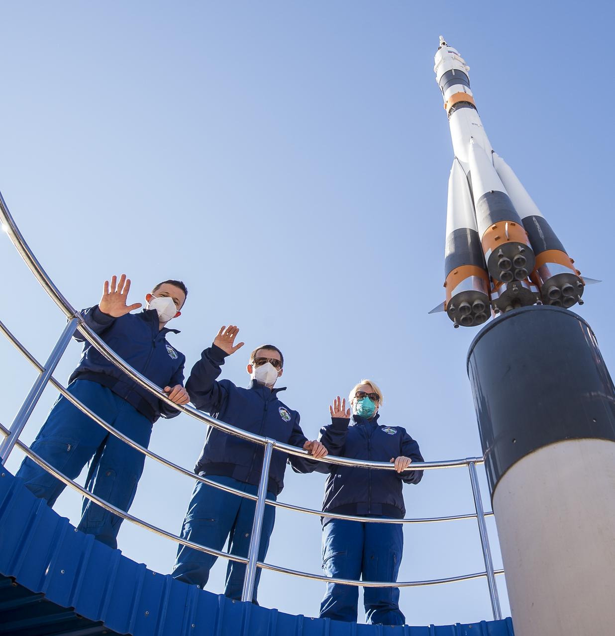 Expedition 64 crew members Russian cosmonauts Sergey Kud-Sverchkov, left, and Sergey Ryzhikov of Roscosmos, center, and NASA astronaut Kate Rubins, right, pose for a picture as part of pre-launch activities, Tuesday, Oct. 6, 2020, at the Cosmonaut Hotel in Baikonur, Kazakhstan. The trio are scheduled to launch to the International Space Station aboard the Soyuz MS-17 spacecraft on October 14. Photo Credit: (NASA/GCTC/Andrey Shelepin)