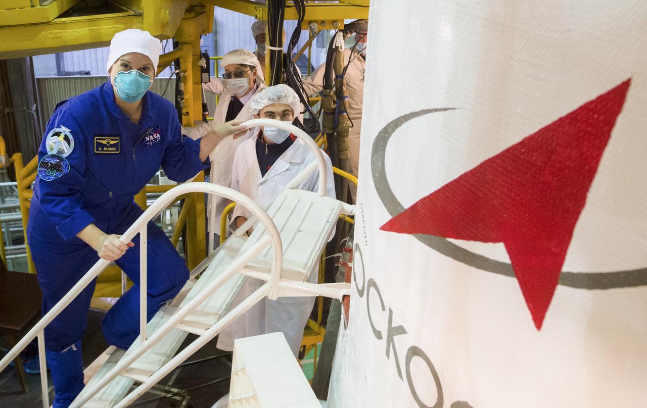 Expedition 64 NASA astronaut Kate Rubins is seen as she climbs inside the Soyuz MS-17 spacecraft during the final fit check, Wednesday, Oct. 7, 2020, at the Baikonur Cosmodrome in Kazakhstan. Rubins and Russian cosmonauts Sergey Ryzhikov and Sergey Kud-Sverchkov of Roscosmos, are scheduled to launch to the International Space Station aboard the Soyuz MS-17 spacecraft on October 14. Photo Credit: (NASA/GCTC/Andrey Shelepin)
