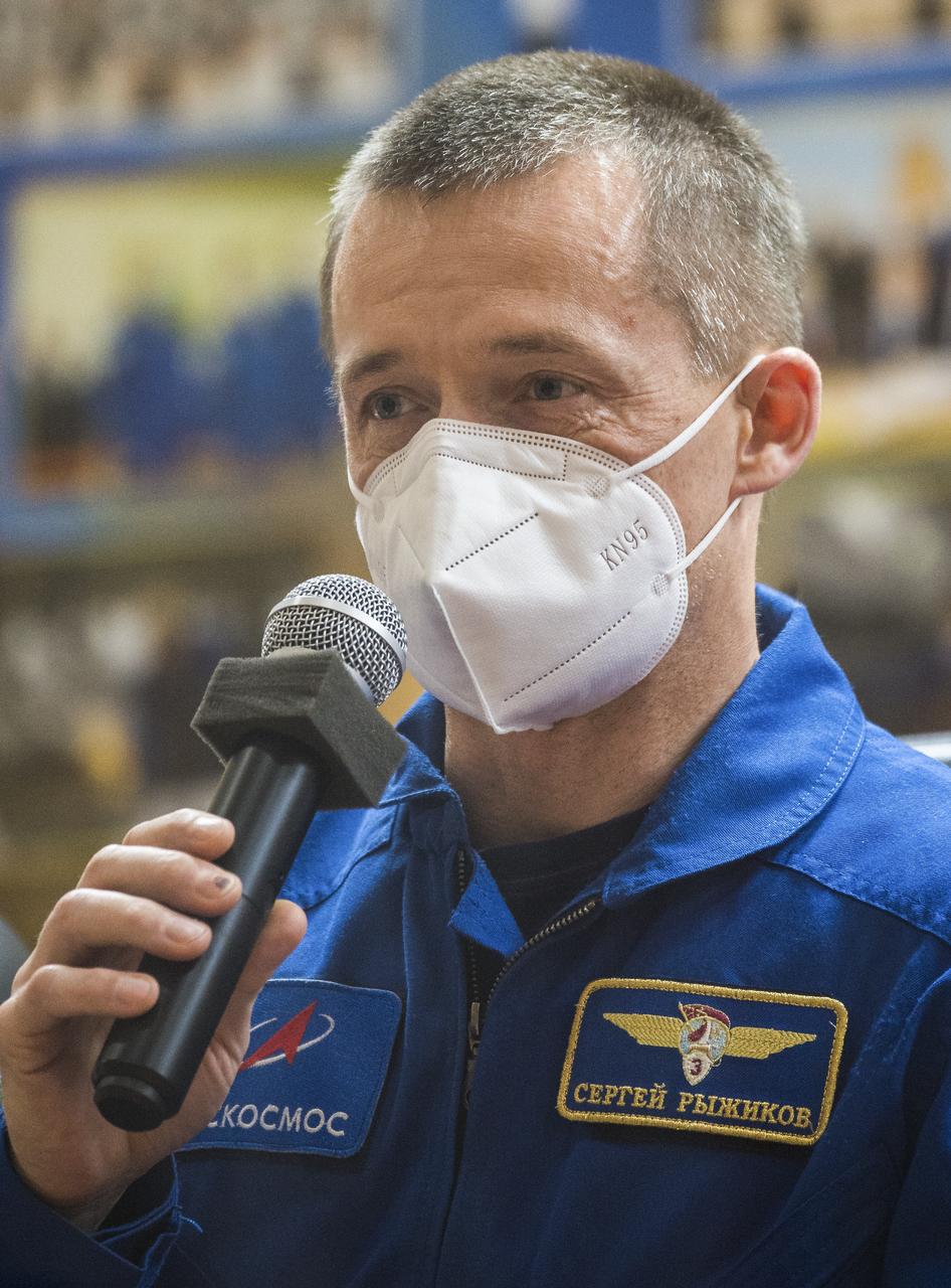 Expedition 64 Russian cosmonaut Sergey Ryzhikov of Roscosmos is seen in quarantine, behind glass, during a press conference, Tuesday, Oct. 13, 2020, at the Cosmonaut Hotel in Baikonur, Kazakhstan. Ryzhikov, fellow cosmonaut Sergey Kud-Sverchkov and NASA astronaut Kate Rubins are scheduled to launch to the International Space Station aboard the Soyuz MS-17 spacecraft on October 14.  Photo Credit: (NASA/GCTC/Andrey Shelepin)