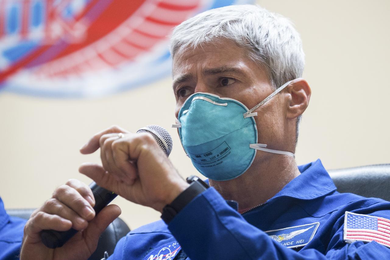 Expedition 64 backup crew member Mark Vande Hei of NASA is seen in quarantine, behind glass, during a press conference, Tuesday, Oct. 13, 2020, at the Cosmonaut Hotel in Baikonur, Kazakhstan. Expedition 64 prime crew members Kate Rubins of NASA, and Sergey Ryzhikov and Sergey Kud-Sverchkov of Roscosmos are scheduled to launch to the International Space Station aboard the Soyuz MS-17 spacecraft on October 14. Photo Credit: (NASA/GCTC/Andrey Shelepin)