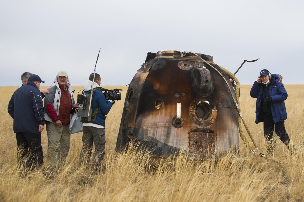 Russian Search and Rescue teams arrive at the Soyuz MS-16 spacecraft shortly after it landed in a remote area near the town of Zhezkazgan, Kazakhstan with Expedition 63 crew members Chris Cassidy of NASA, Anatoly Ivanishin and Ivan Vagner of Roscosmos, Thursday, October 22, 2020, Kazakh time (Oct. 21 Eastern time). Cassidy, Ivanishin and Vagner returned after 196 days in space having served as Expedition 62-63 crew members onboard the International Space Station. Photo Credit: (NASA/GCTC/Denis Derevtsov)