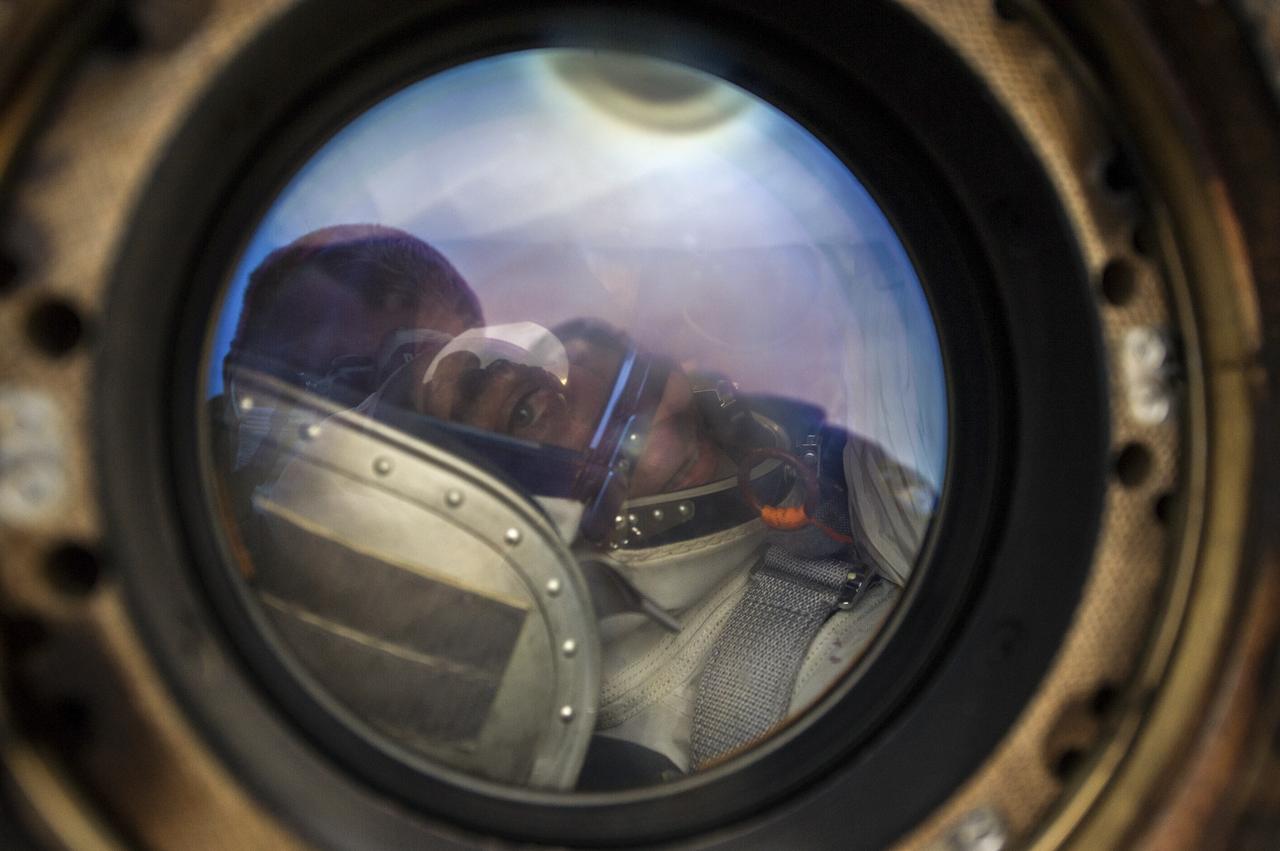 Expedition 63 NASA astronaut Chris Cassidy smiles from inside the Soyuz MS-16 spacecraft just minutes after he and Roscosmos cosmonauts Ivan Vagner, and Anatoly Ivanishin, landed in a remote area near the town of Zhezkazgan, Kazakhstan on Thursday, October 22, 2020, Kazakh time (Oct. 21 Eastern time). Cassidy, Ivanishin and Vagner returned after 196 days in space having served as Expedition 62-63 crew members onboard the International Space Station. Photo Credit: (NASA/GCTC/Denis Derevtsov)