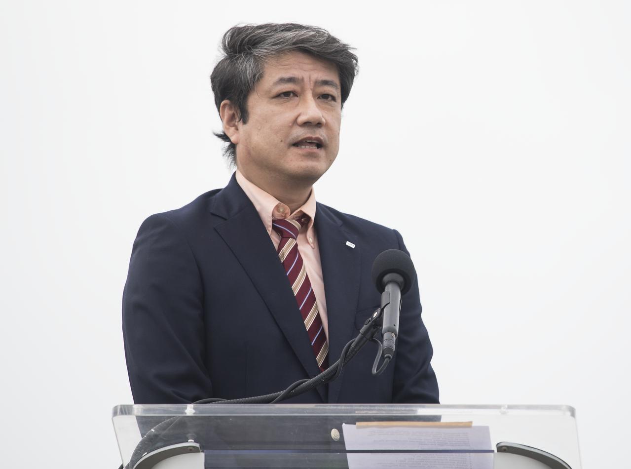 Junichi Sakai, manager of the International Space Station Program for the Japan Aerospace Exploration Agency (JAXA) speaks to members of the media following the arrival of NASA astronauts Mike Hopkins, Victor Glover, and Shannon Walker, and astronaut Soichi Noguchi of the Japan Aerospace Exploration Agency (JAXA) at the Launch and Landing Facility at NASA’s Kennedy Space Center ahead of SpaceX’s Crew-1 mission, Sunday, Nov. 8, 2020, in Florida. NASA’s SpaceX Crew-1 mission is the first operational mission of the SpaceX Crew Dragon spacecraft and Falcon 9 rocket to the International Space Station as part of the agency’s Commercial Crew Program. Hopkins, Glover, Walker, Noguchi are scheduled to launch at 7:49 p.m. EST on Saturday, Nov. 14, from Launch Complex 39A at the Kennedy Space Center. Photo Credit: (NASA/Joel Kowsky)